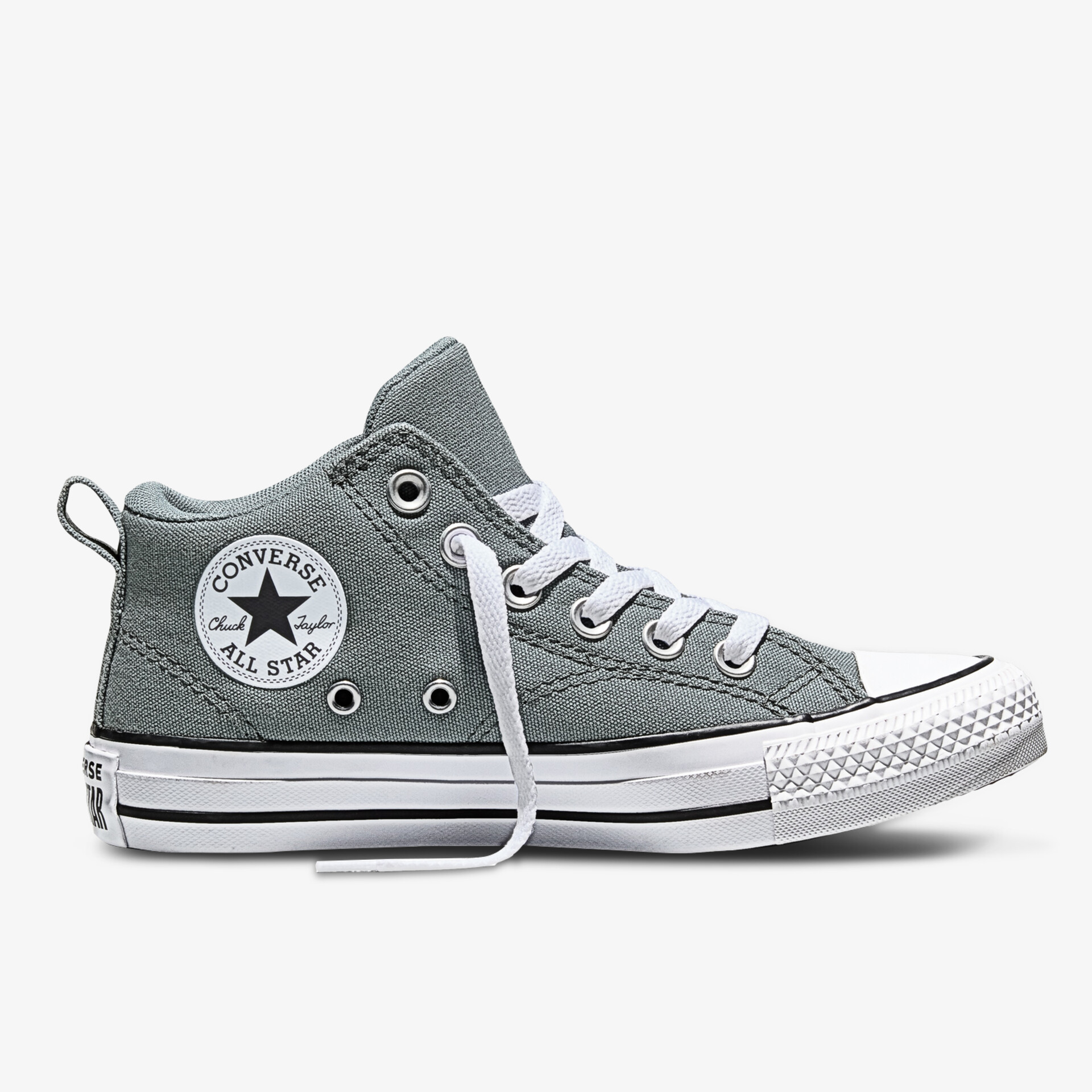 Seitliche Ansicht eines grauen Sneakers mit robustem Profil und klassischem Design für hohen Komfort