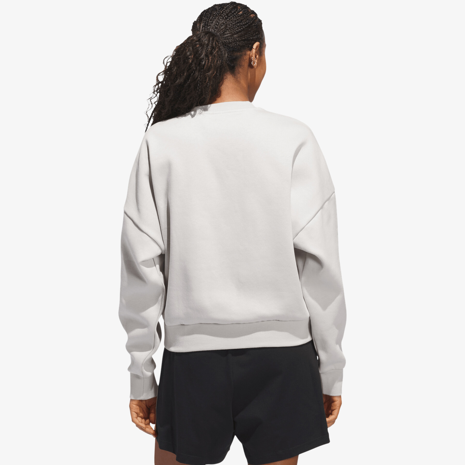 Rückenansicht eines hellgrauen Sweatshirts mit lockerem Schnitt und elastischem Bund