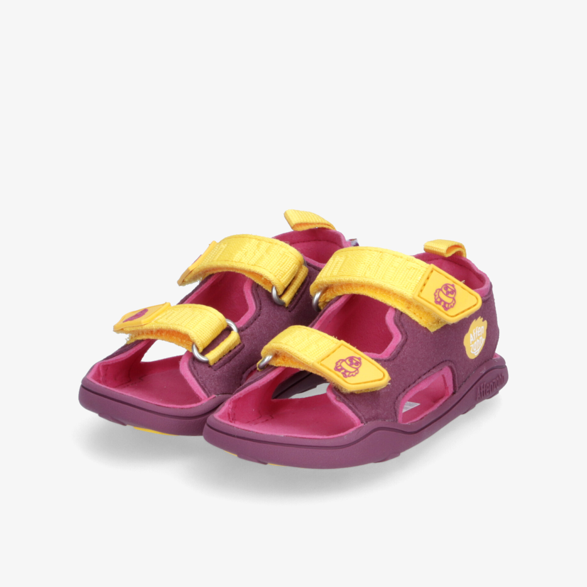 Lila und gelbe Sandalen mit Klettverschluss, komfortabel und stilvoll, ideal für Alltag und Freizeit.