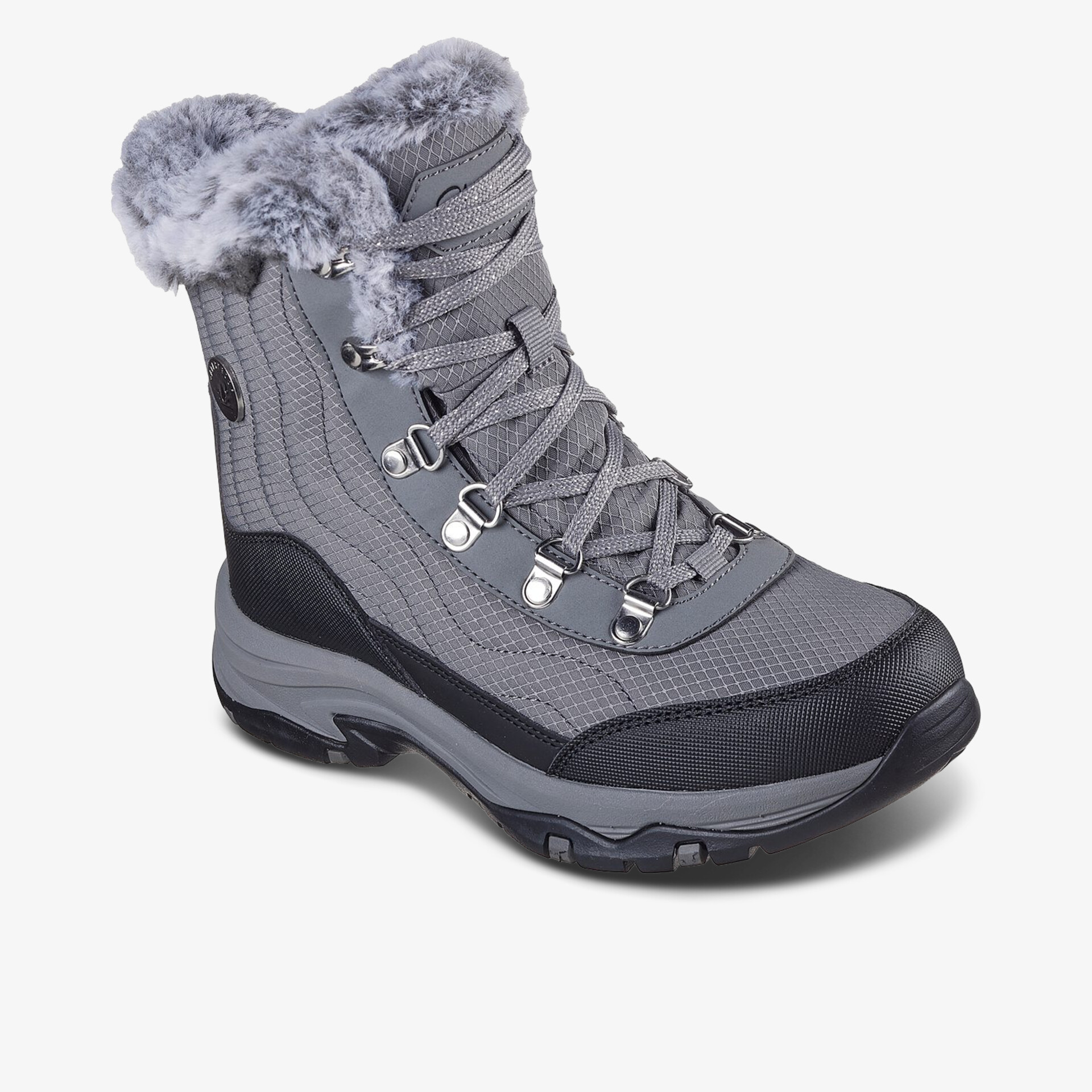 Robuster grauer Winterschuh mit warmem Fellfutter und rutschfester Profilsohle für sicheren Halt