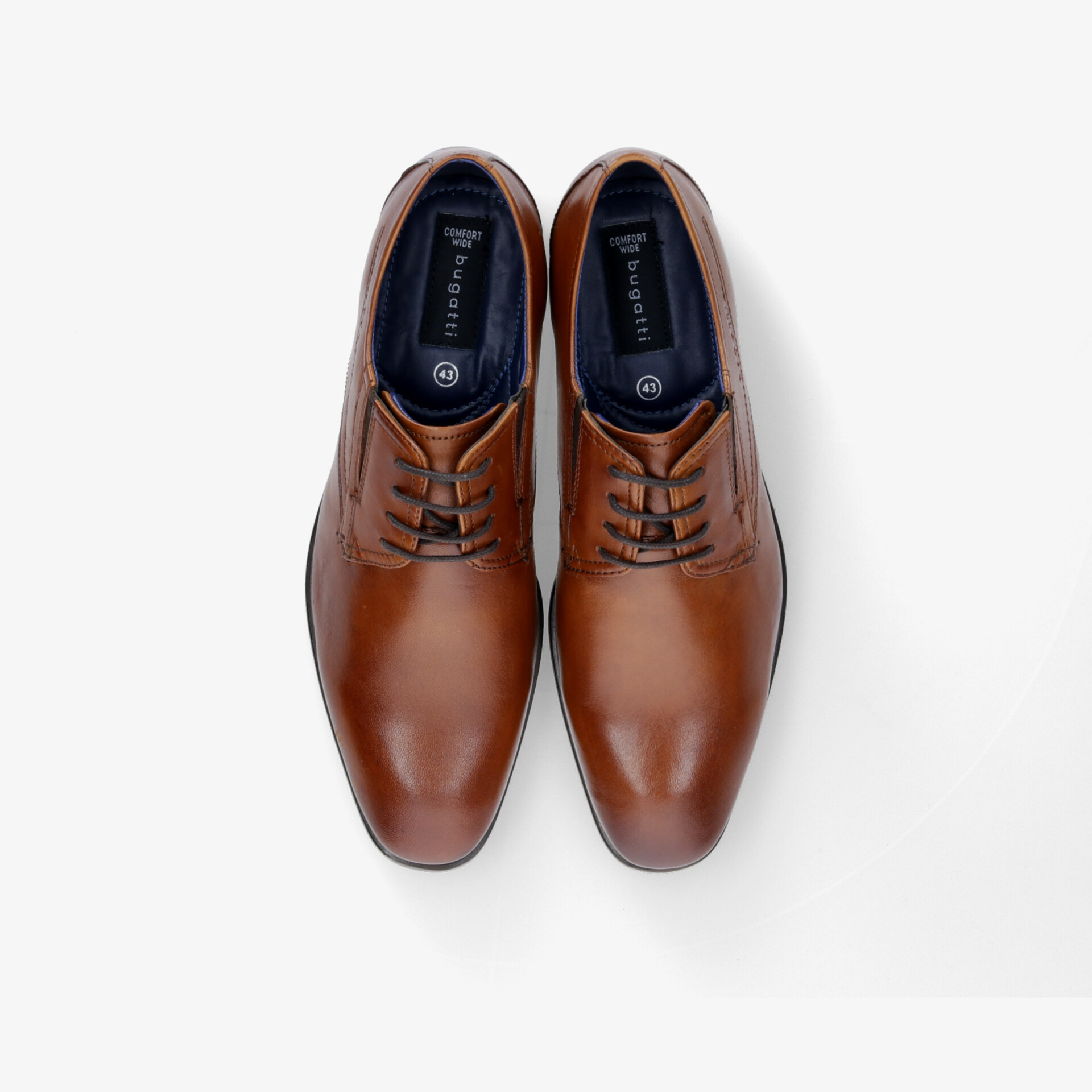 Elegante braune Lederschuhe im klassischen Oxford-Stil, perfekt für formelle Anlässe und stilvolle Auftritte.
