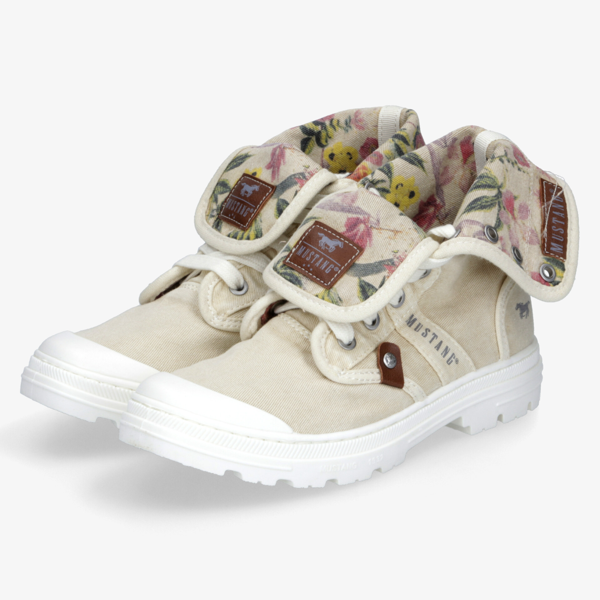 Bequeme beige Freizeitschuhe mit floralem Innenfutter, Klettverschluss und robuster weißer Gummisohle, ideal für Alltag und Freizeit.