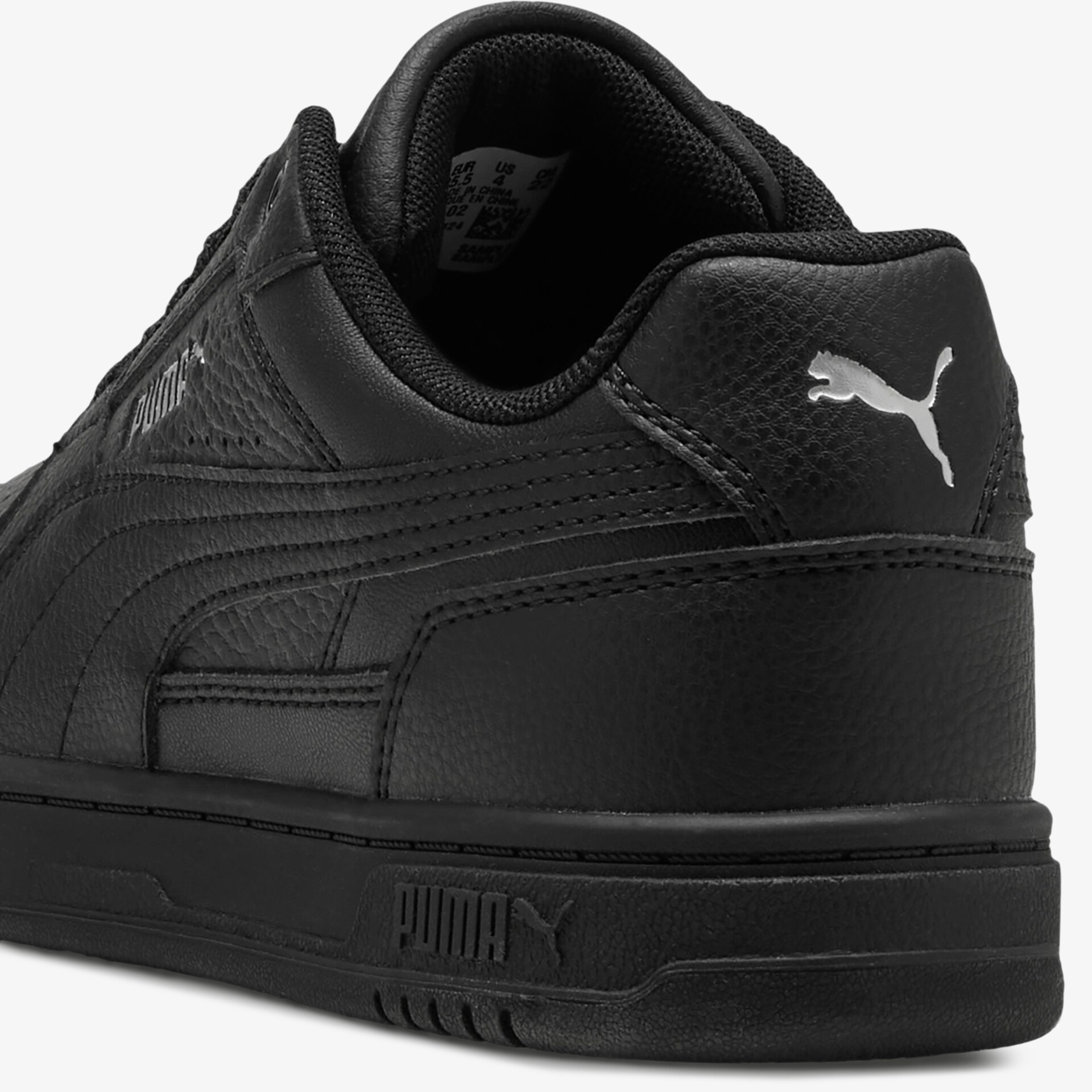 Schwarzer Puma Sneaker aus Leder mit sportlichem, robustem Design und bequemer Passform, Rückansicht