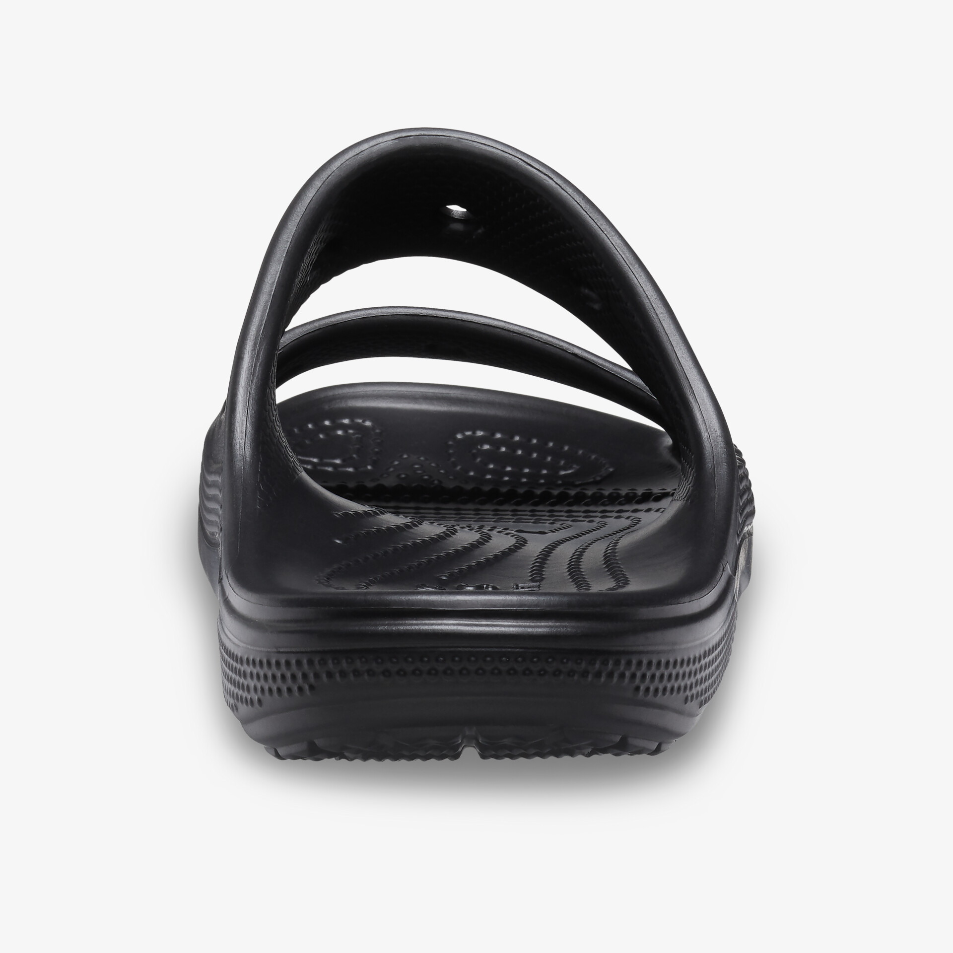 Rückansicht einer schwarzen Sandale mit rutschfester Sohle und ergonomischem Fußbett für hohen Tragekomfort