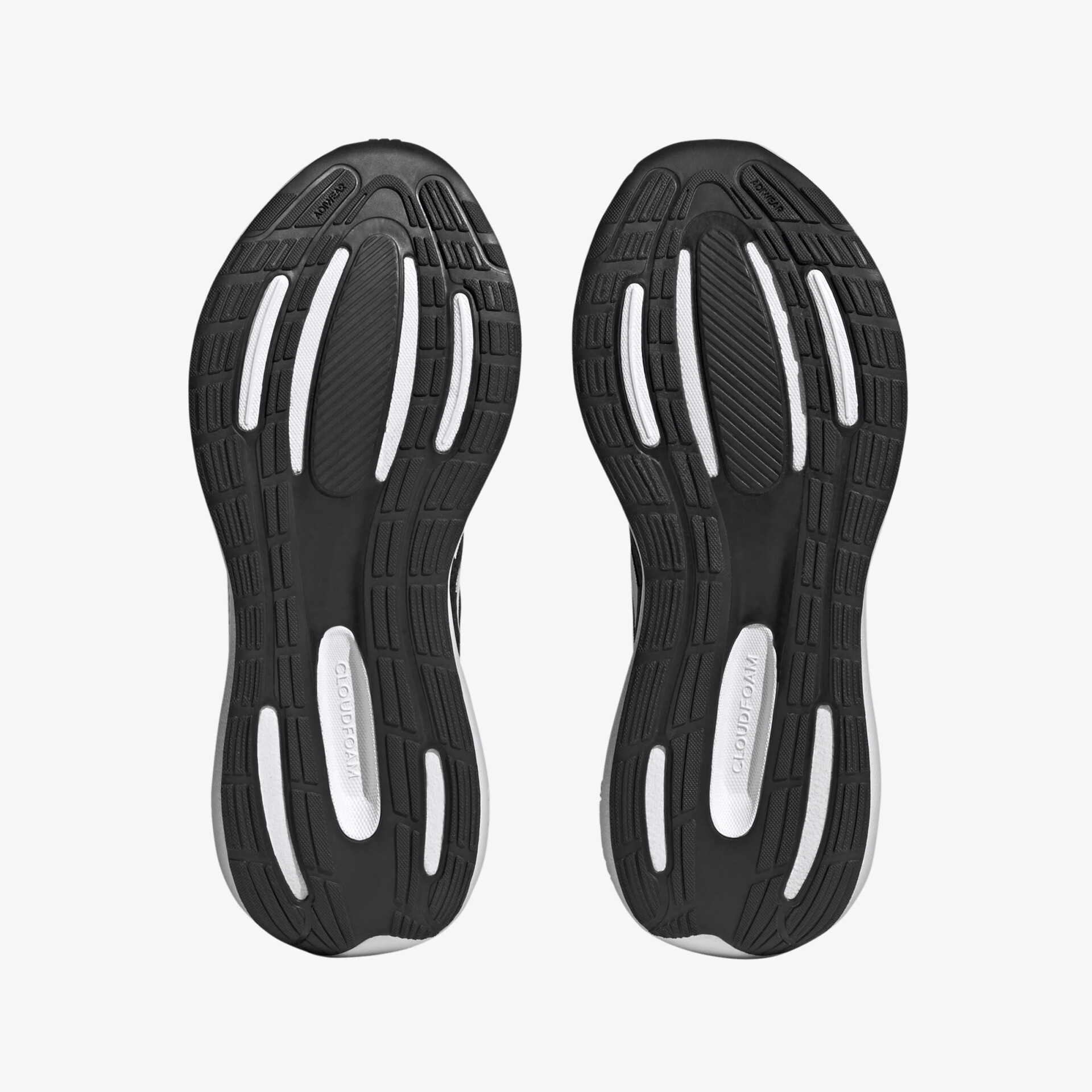 Schuhsohlen in Schwarz-Weiß mit langlebigen Design und hervorragender Traktion für sportliche Aktivitäten.