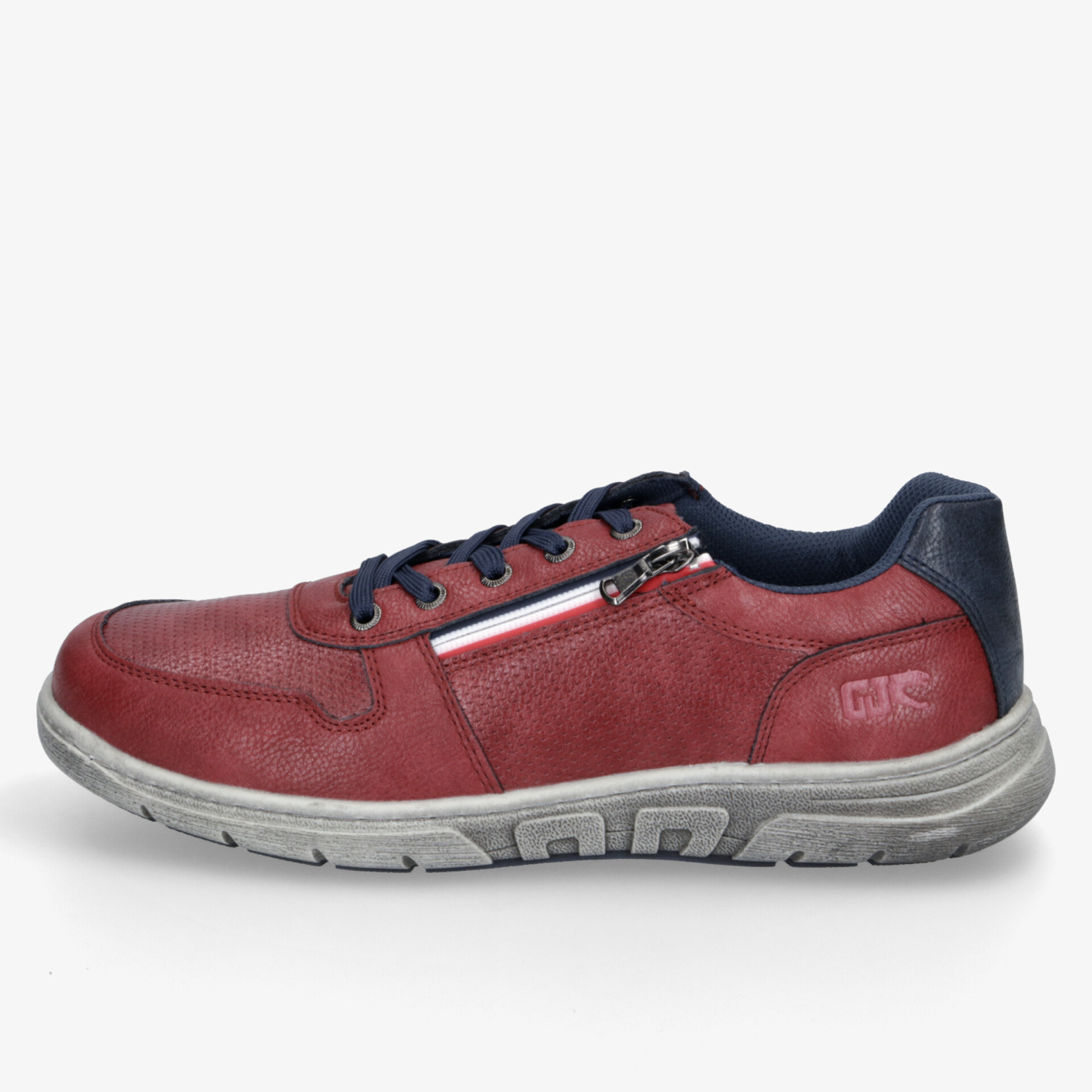 Komfortabler Schuh mit seitlichem Reißverschluss, stabiler Gummisohle und sportlichem Design in seitlicher Ansicht