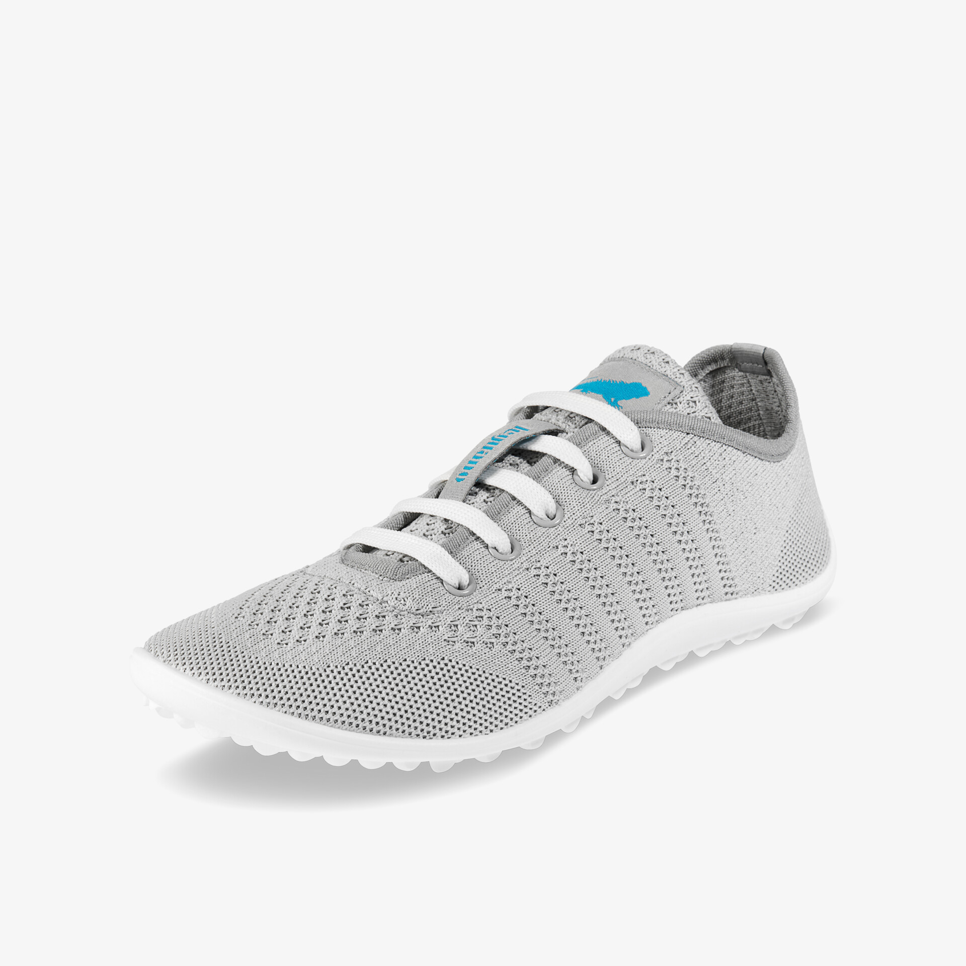 Graue, atmungsaktive Sneakers mit flexibler Sohle und sportlichem Design für optimalen Tragekomfort.