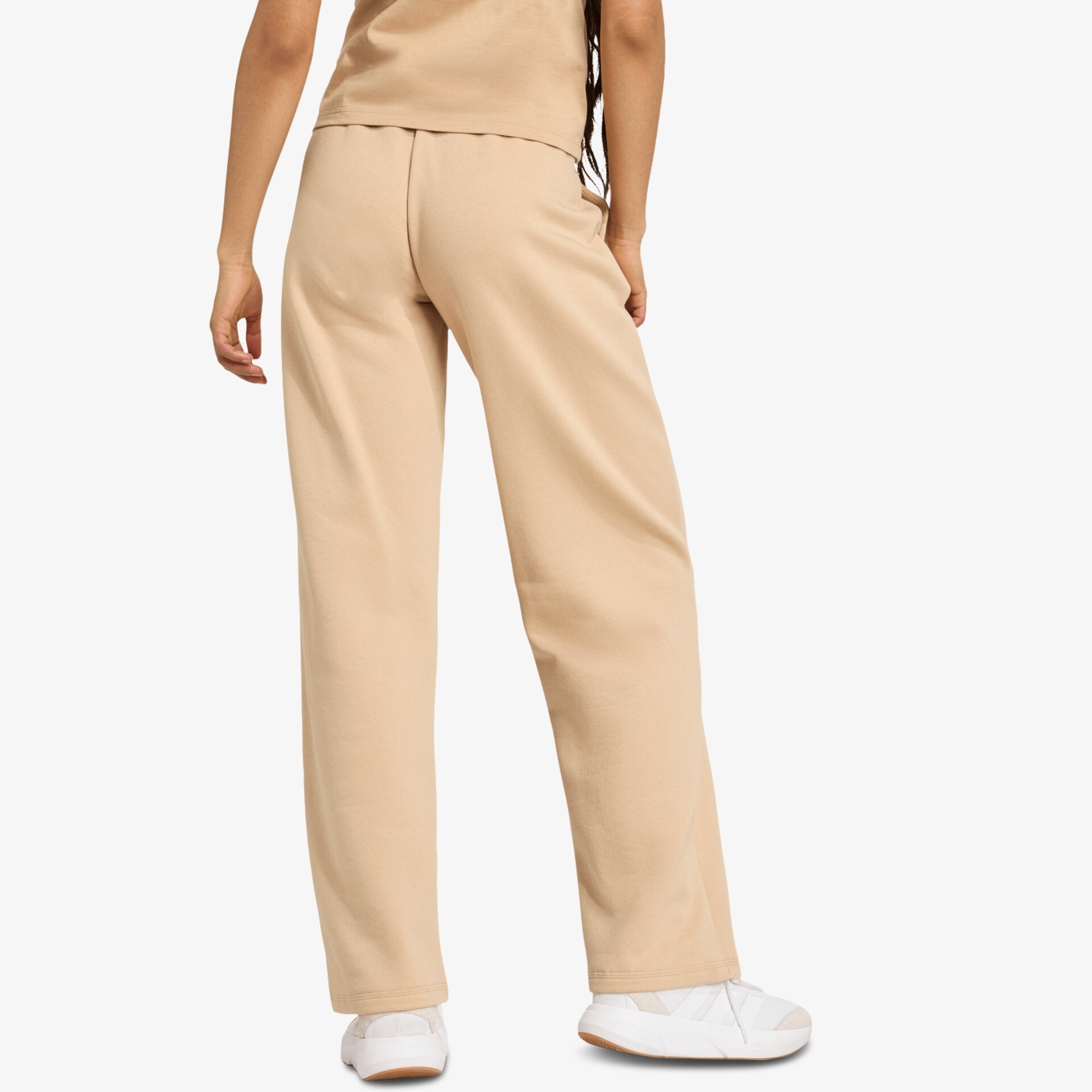 Moderne Hose in beigem Farbton mit lockerer Passform und hohem Bund, ideal für lässige Outfits
