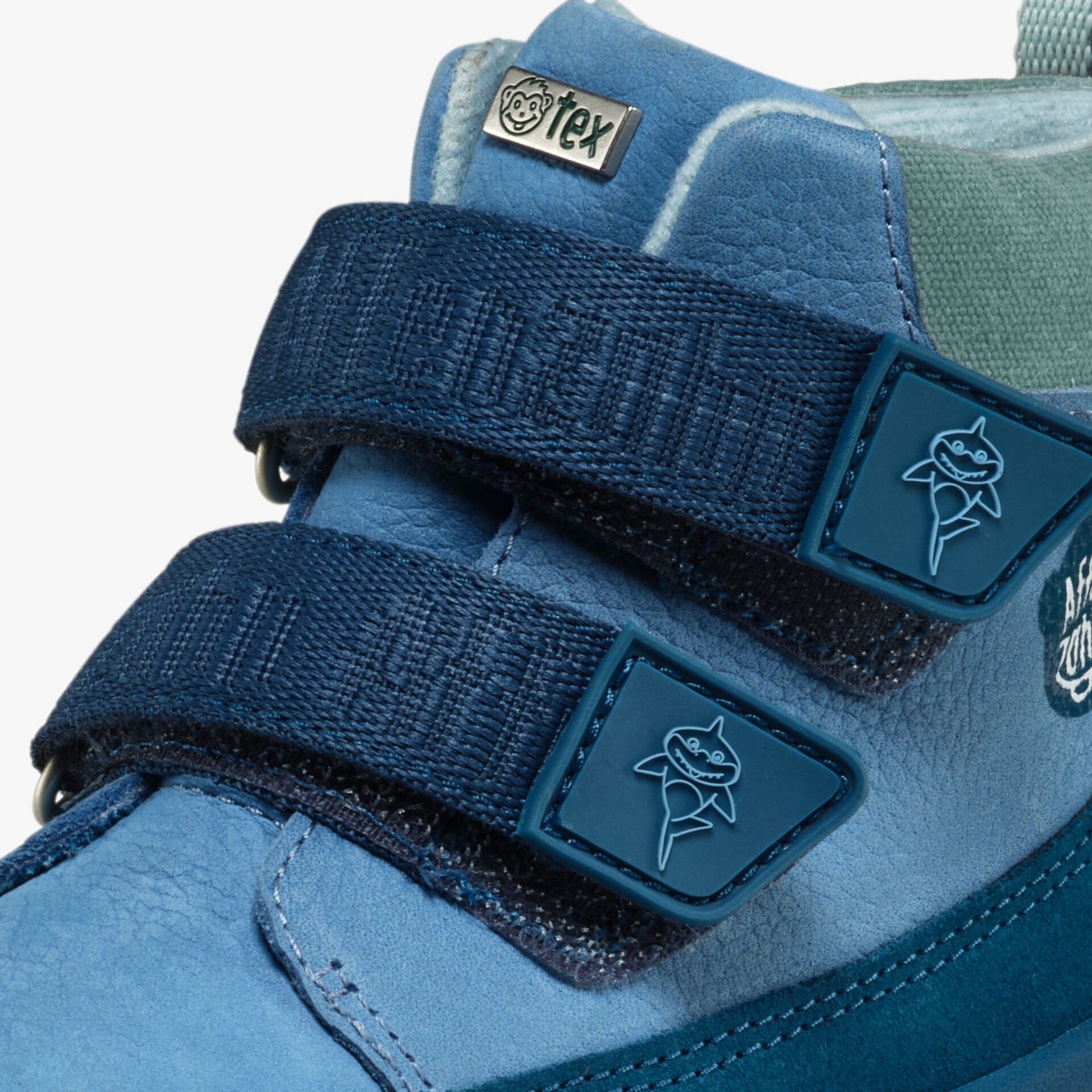 Robuste blaue Outdoor-Schuhe mit praktischem Klettverschluss für sicheren Halt und Komfort