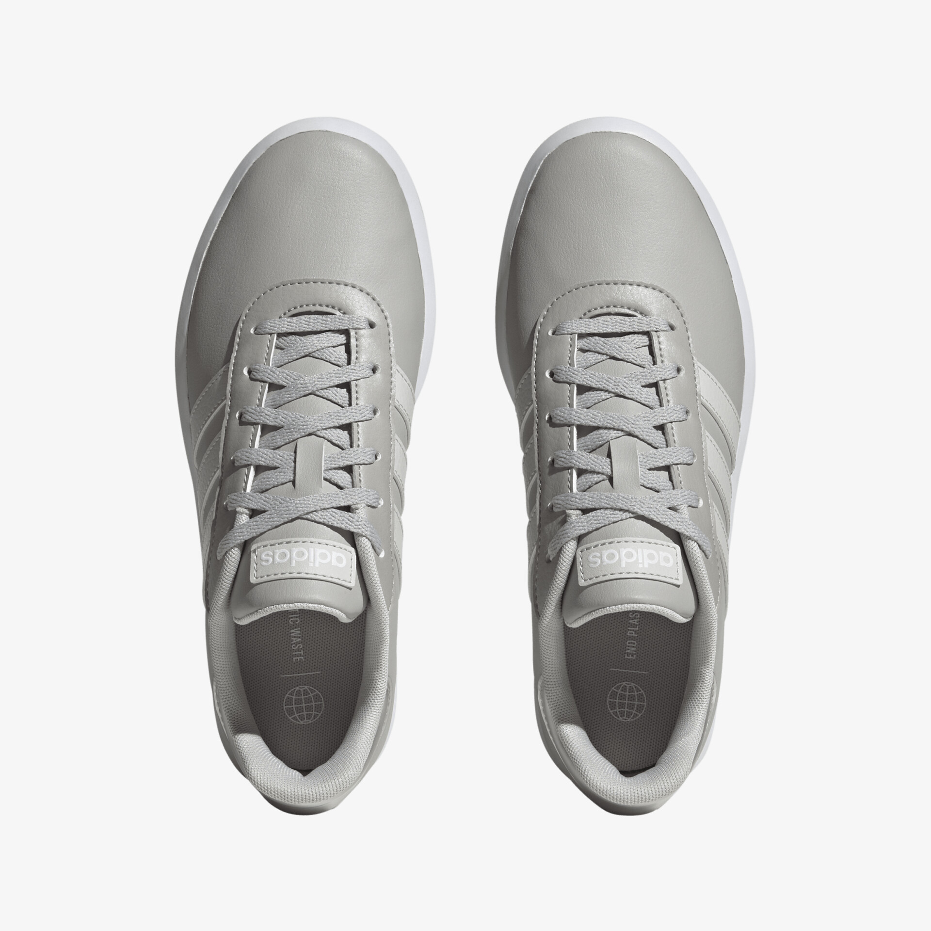 Graue, stilvolle Sneaker mit Schnürung, ideal für Alltag und sportliche Aktivitäten. Robuste Sohle für Komfort.