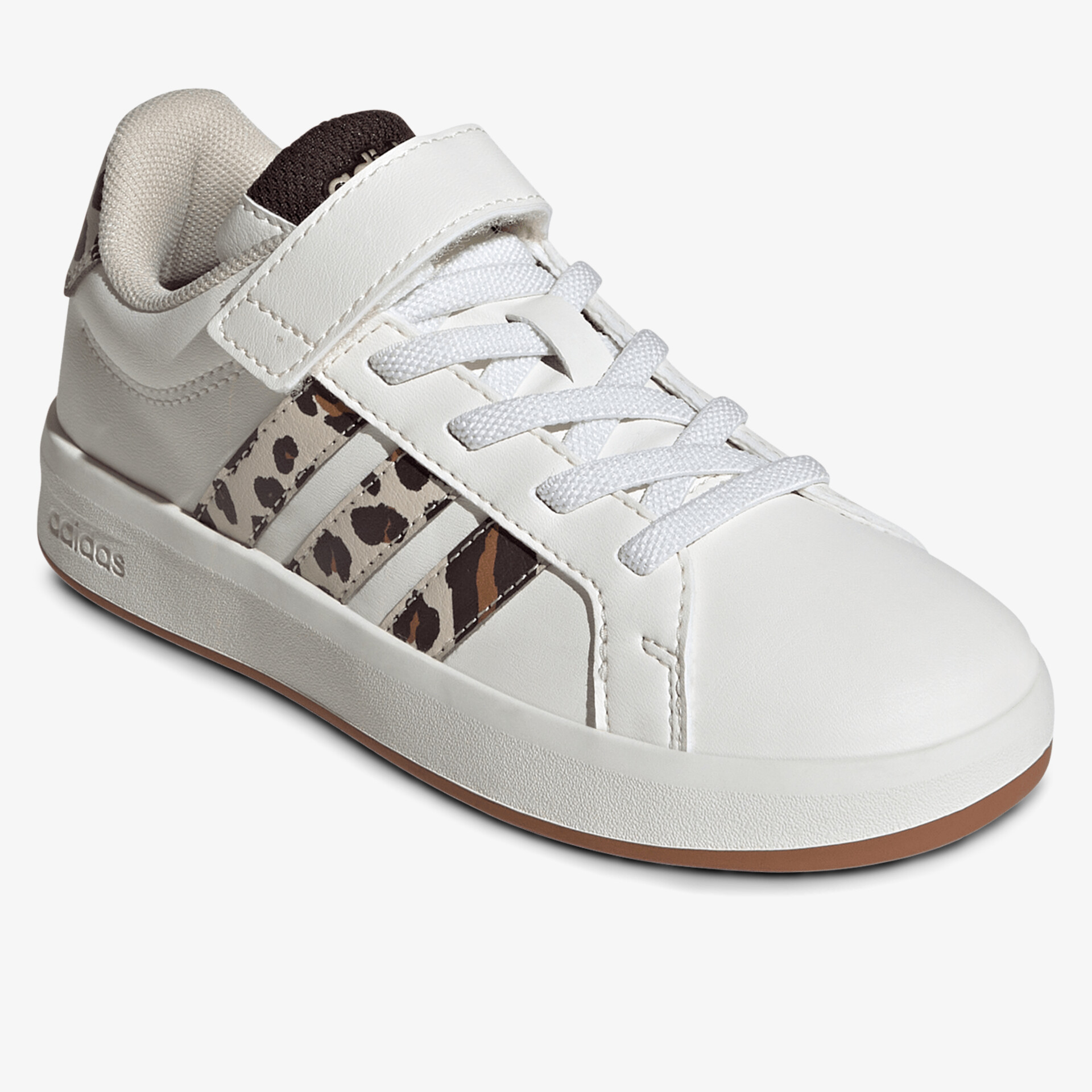 Moderner weißer Sneaker mit Leopardenmuster und Klettverschluss für optimalen Tragekomfort.