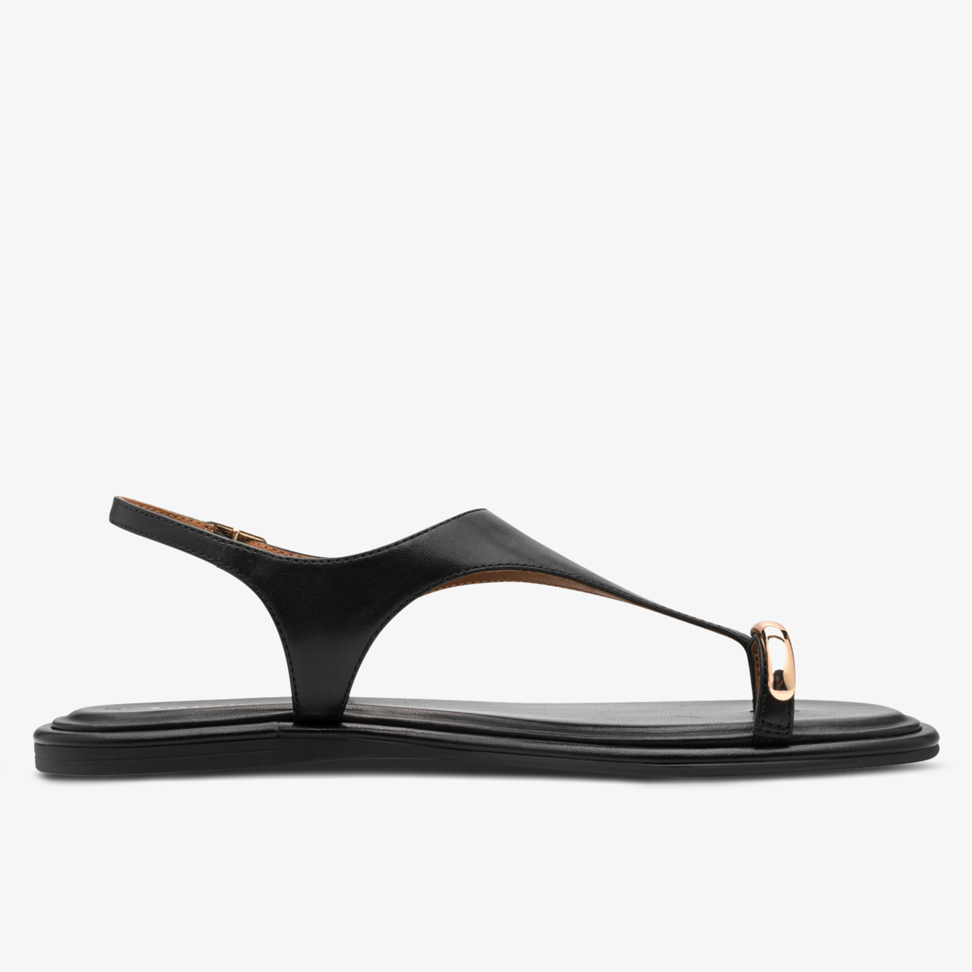 Minimalistisch gestaltete flache Sandale mit elegantem Zehensteg und bequemer Passform, seitliche Ansicht.