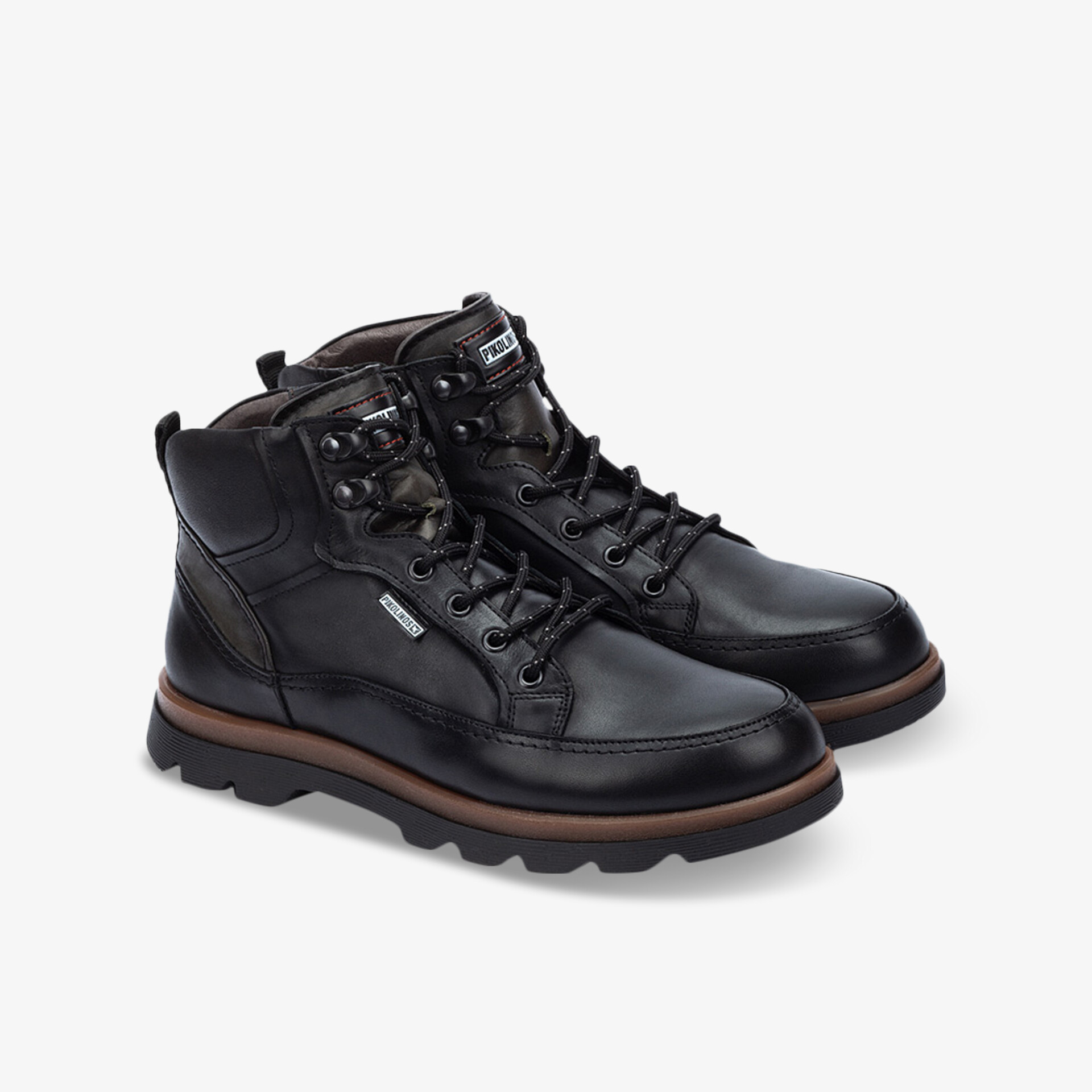 Robuste schwarze Lederstiefel mit gepolstertem Knöchel und rutschfester, profilierter Sohle, ideal für kalte Tage
