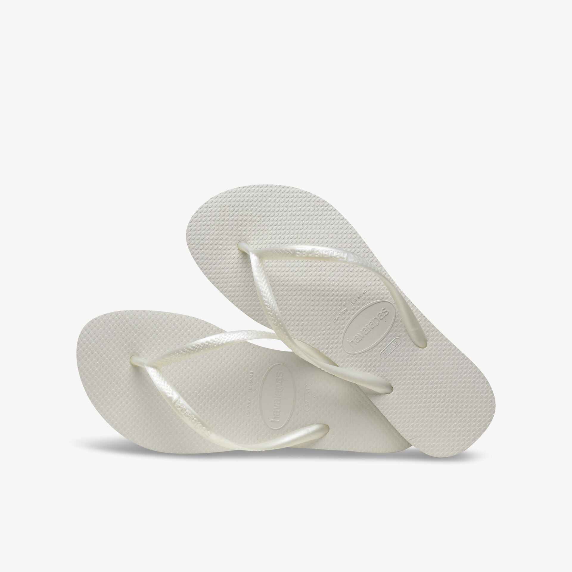 Klassische weiße Flip-Flops mit bequemem Design und strapazierfähiger Sohle, ideal für den Sommer.