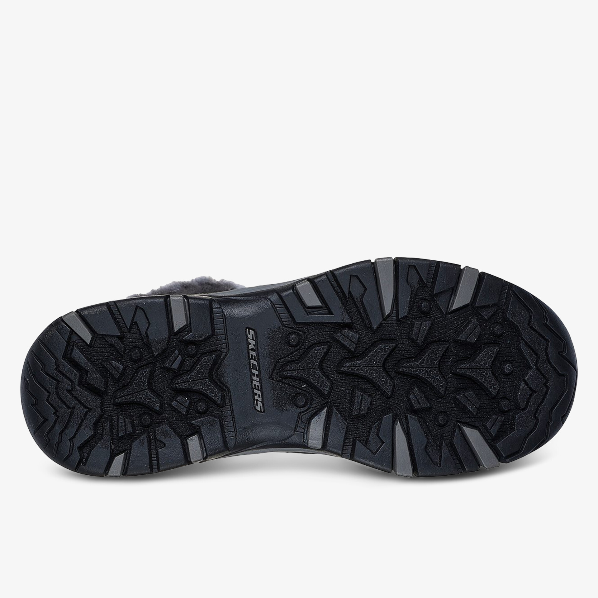 Robuste schwarze Schuhsohle mit tiefem, rutschfestem Profil für optimale Trittsicherheit auf verschiedenen Untergründen