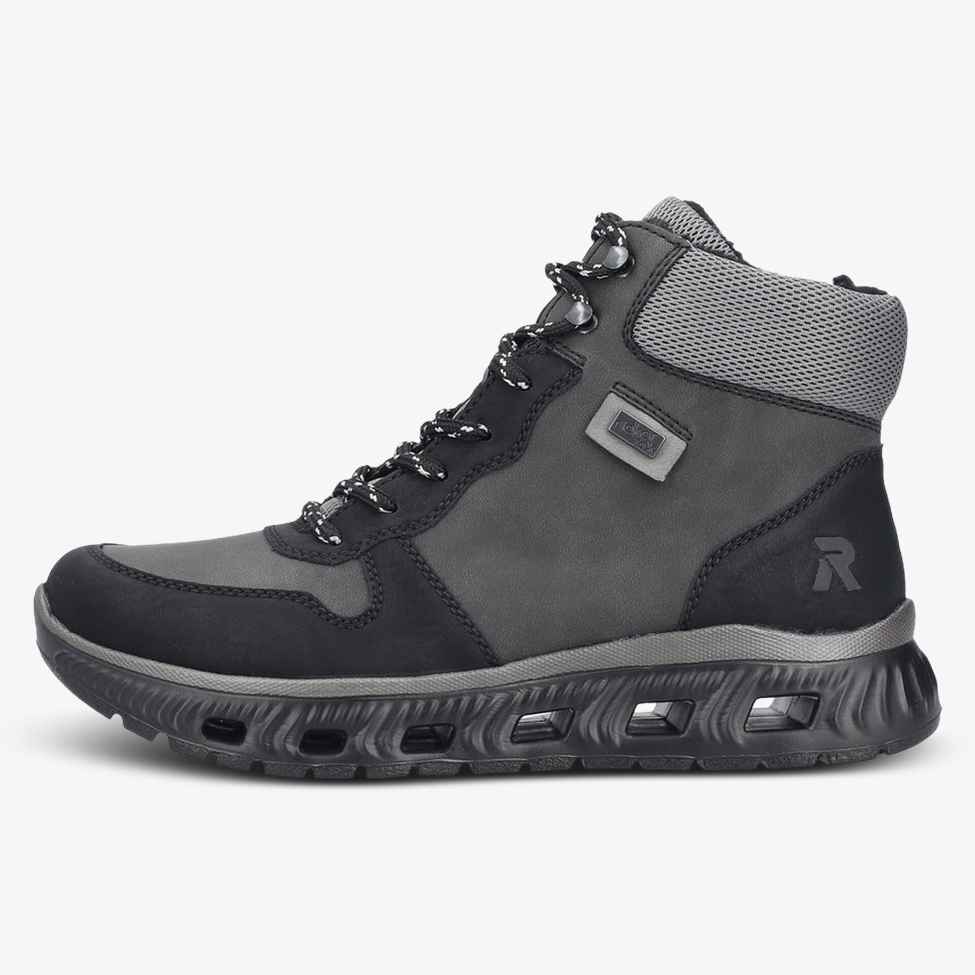 Moderner robuster grauer Schuh mit atmungsaktivem Material und rutschfester Sohle