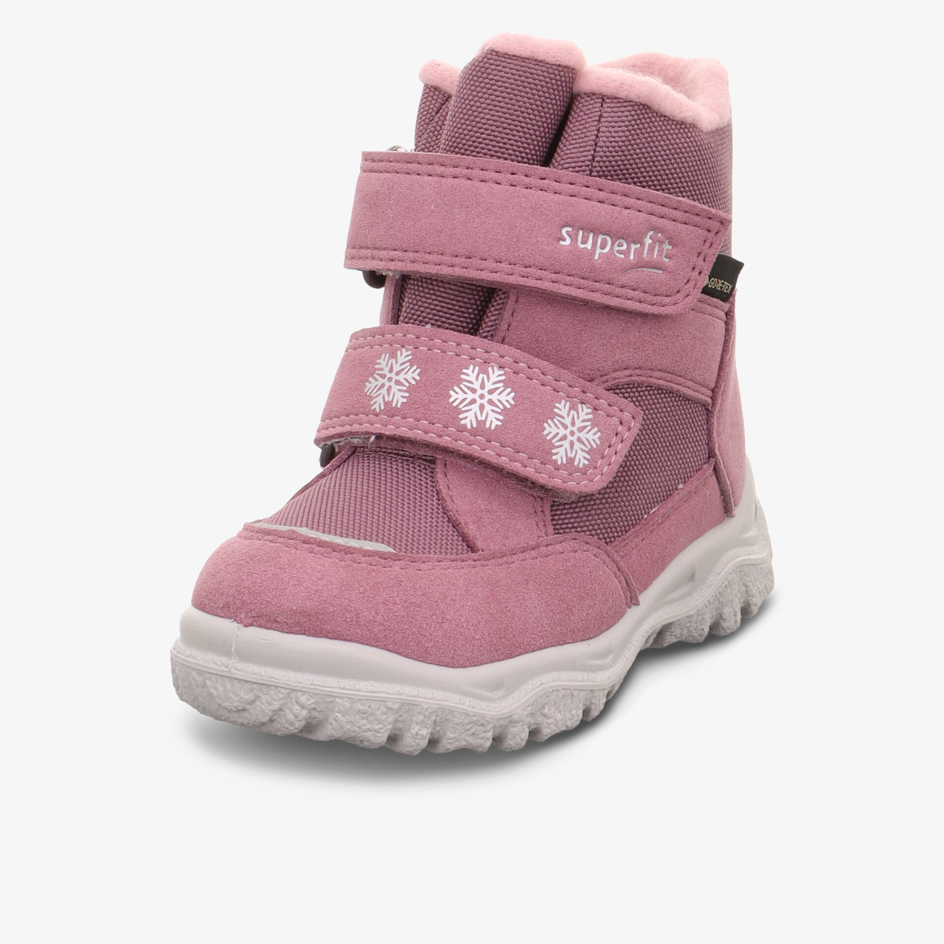 Warmer rosa Kinderschuh mit praktischem Klettverschluss und rutschfester robuster Sohle für kalte Tage