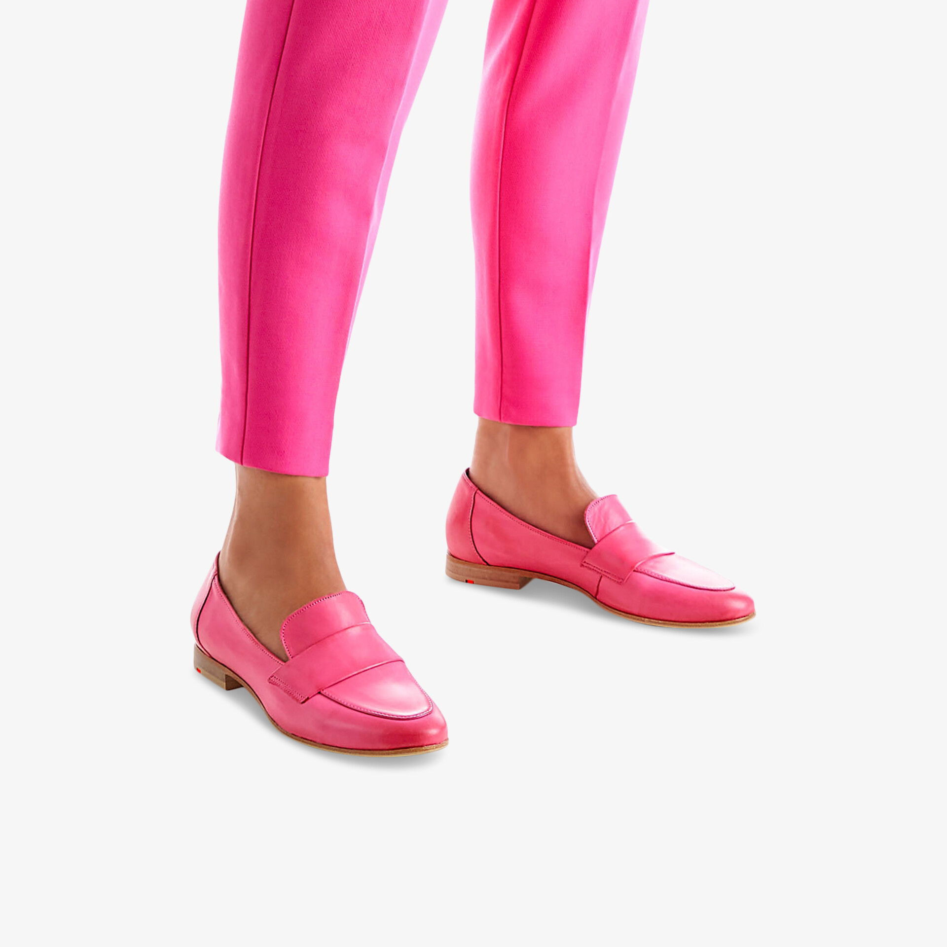 Stilvolle pinke Loafers aus Leder, perfekt für einen komfortablen und modischen Auftritt im Alltag.
