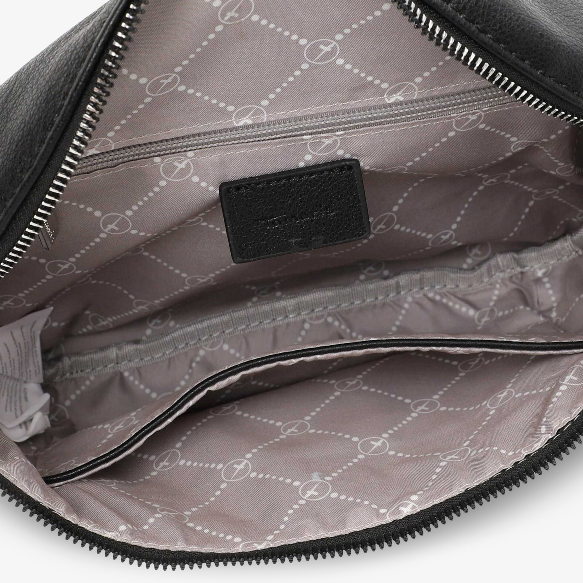 Detailaufnahme eines hochwertigen Tascheninnenfachs mit praktischem Reißverschluss und sauberer Verarbeitung