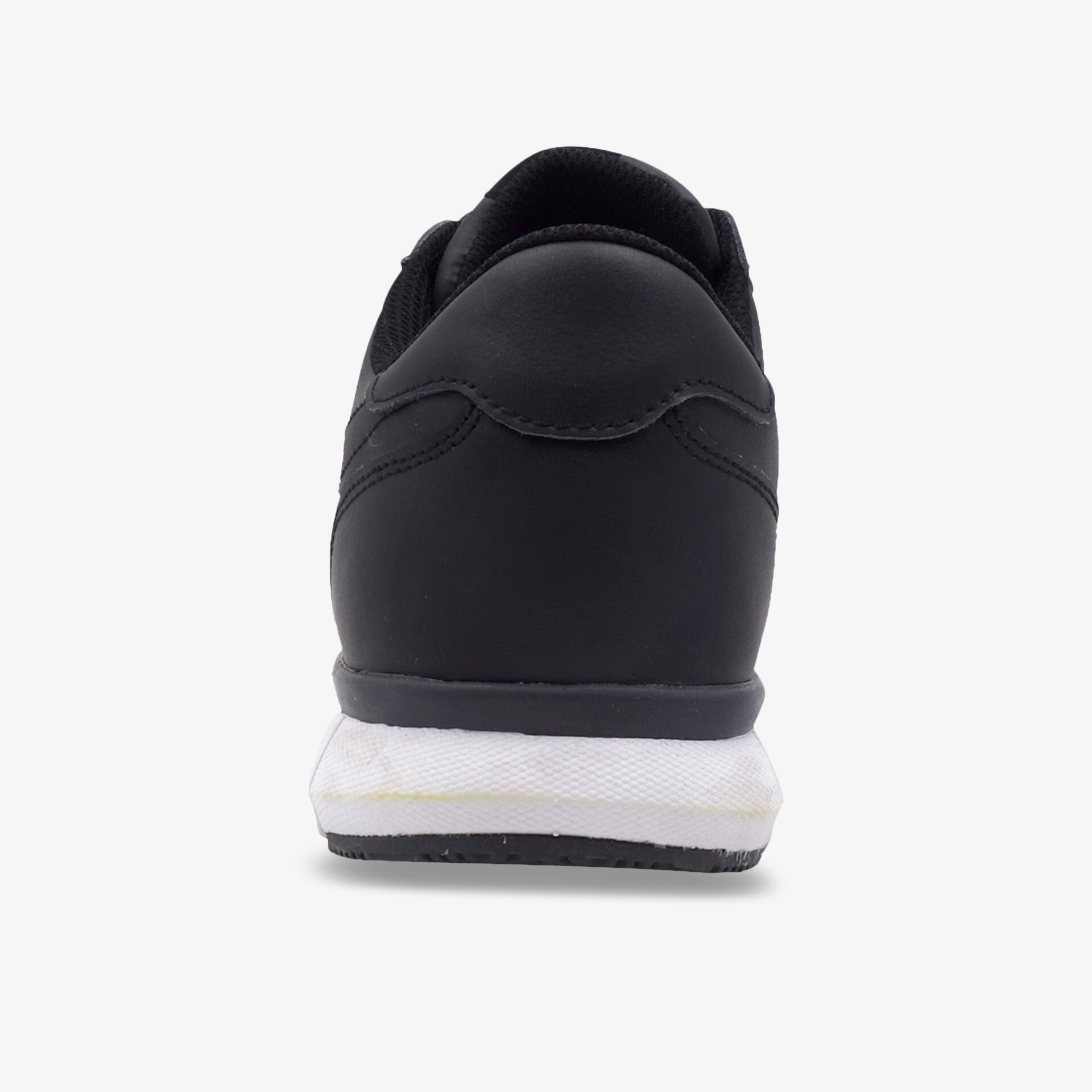 Moderner schwarzer Sneaker mit weißer Sohle, ideal für Komfort und Alltag.