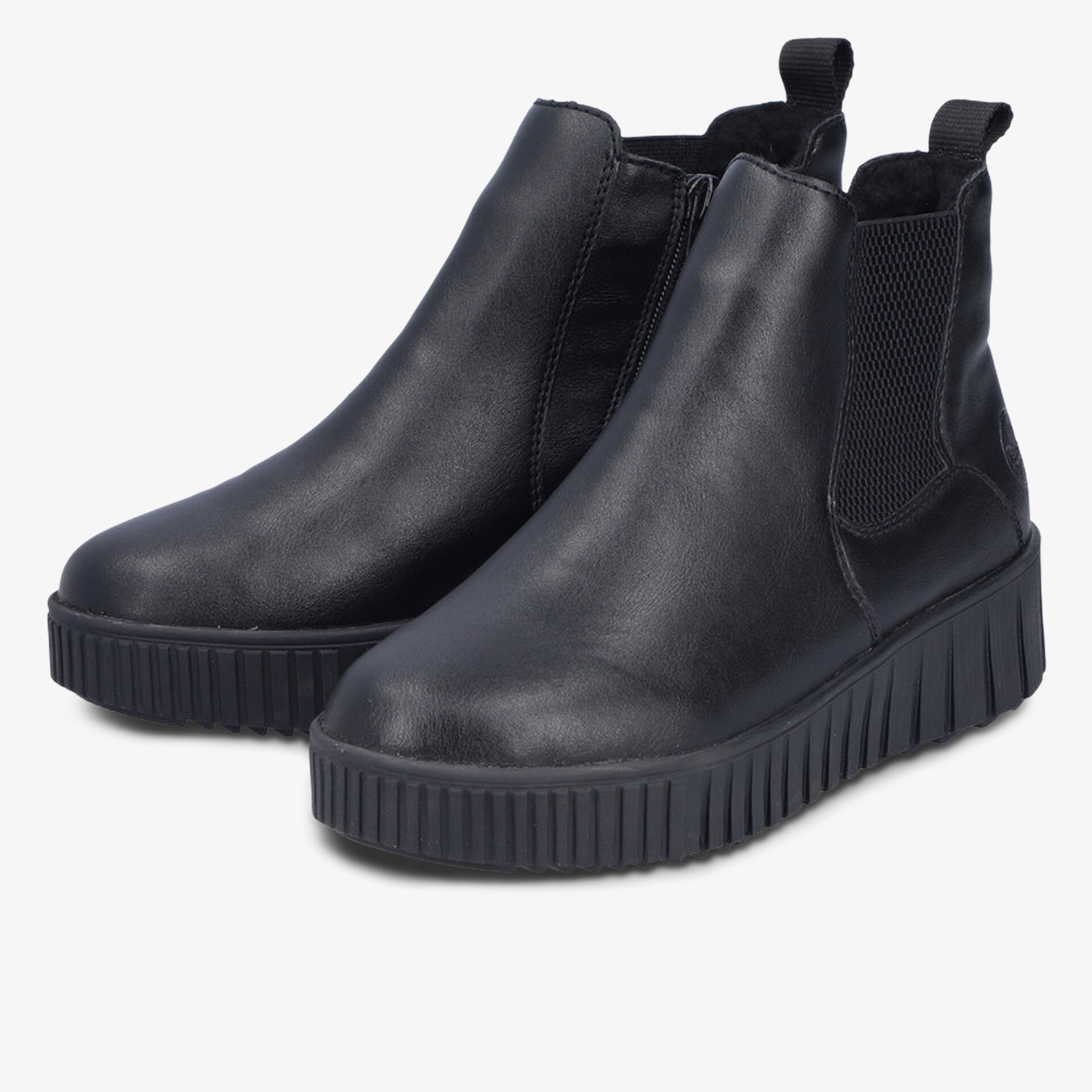 Schwarze Chelsea Boots mit elastischem Einsatz, robuster Sohle und modernem Design in seitlicher Ansicht