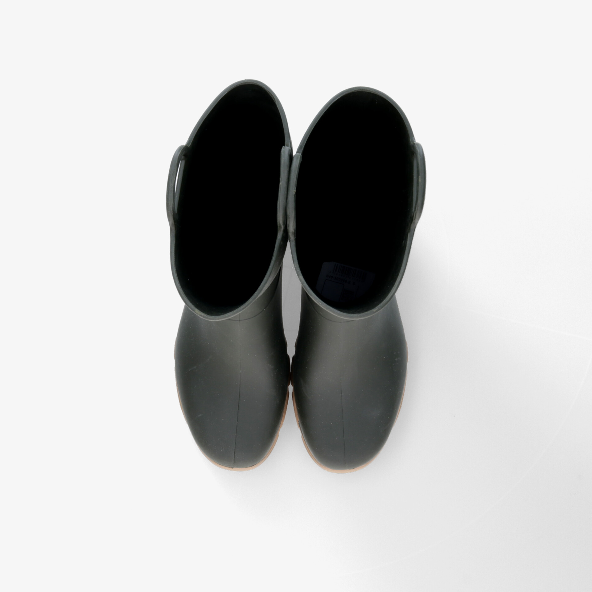 Schwarze wasserdichte Gummistiefel als Paar in Draufsicht, robust und rutschfest mit komfortablem Design