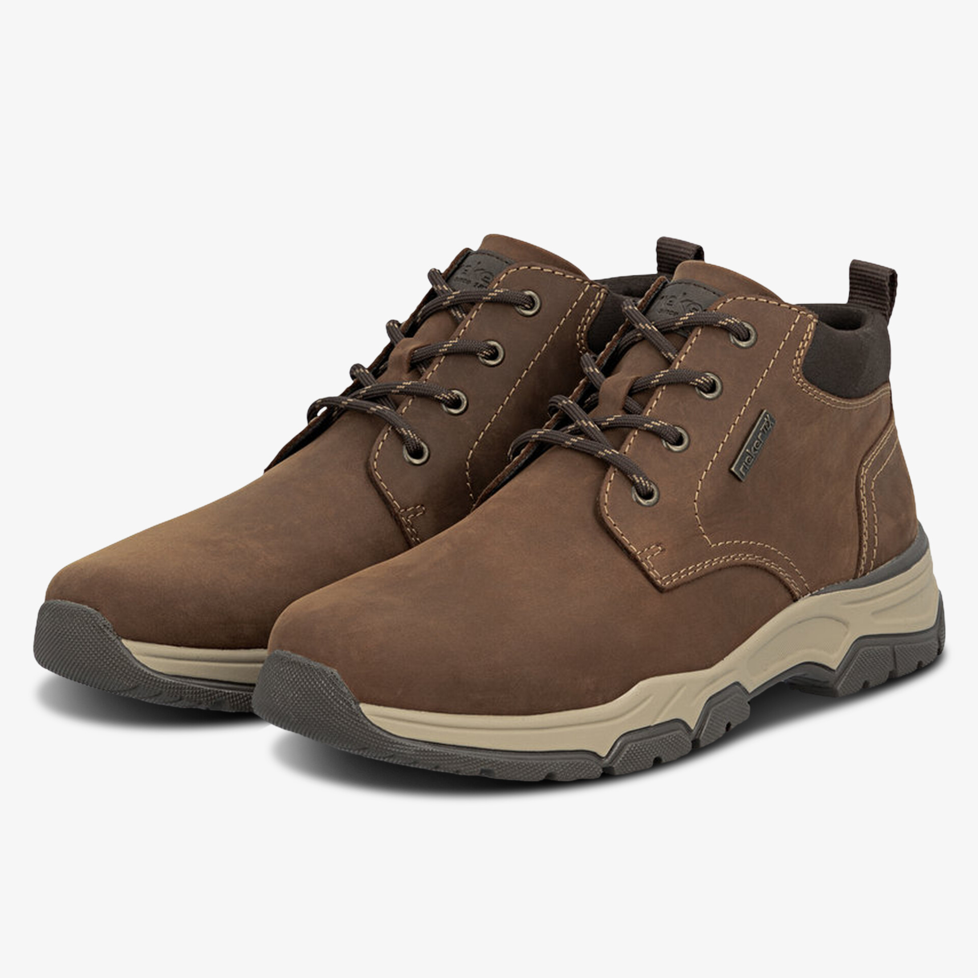 Moderne braune Outdoor-Schuhe mit robuster Sohle und bequemer Passform, ideal für Alltag und Freizeit