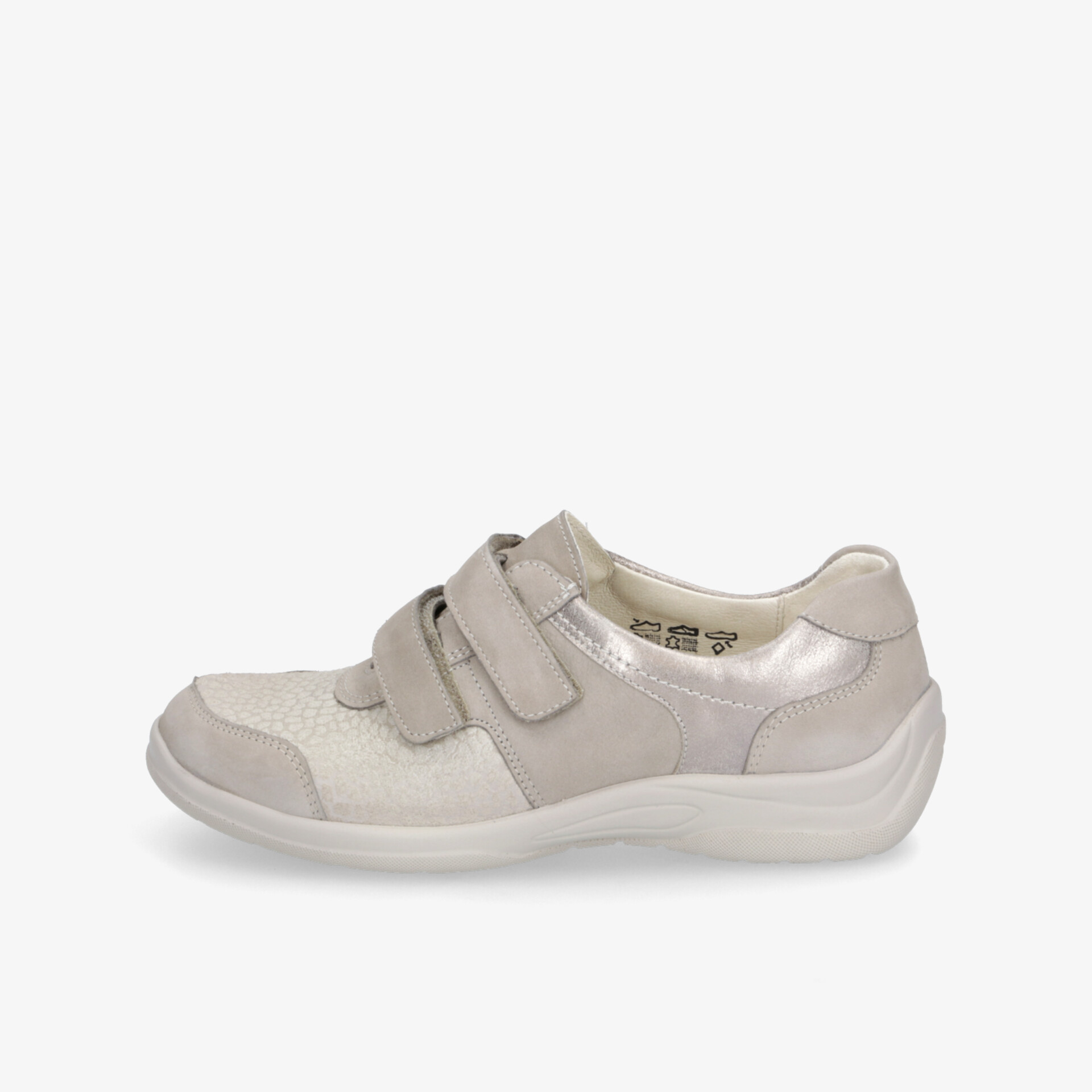 Bequemer Schuh mit zwei Klettverschlüssen und robuster, flexibler Sohle in neutralem hellen Farbton