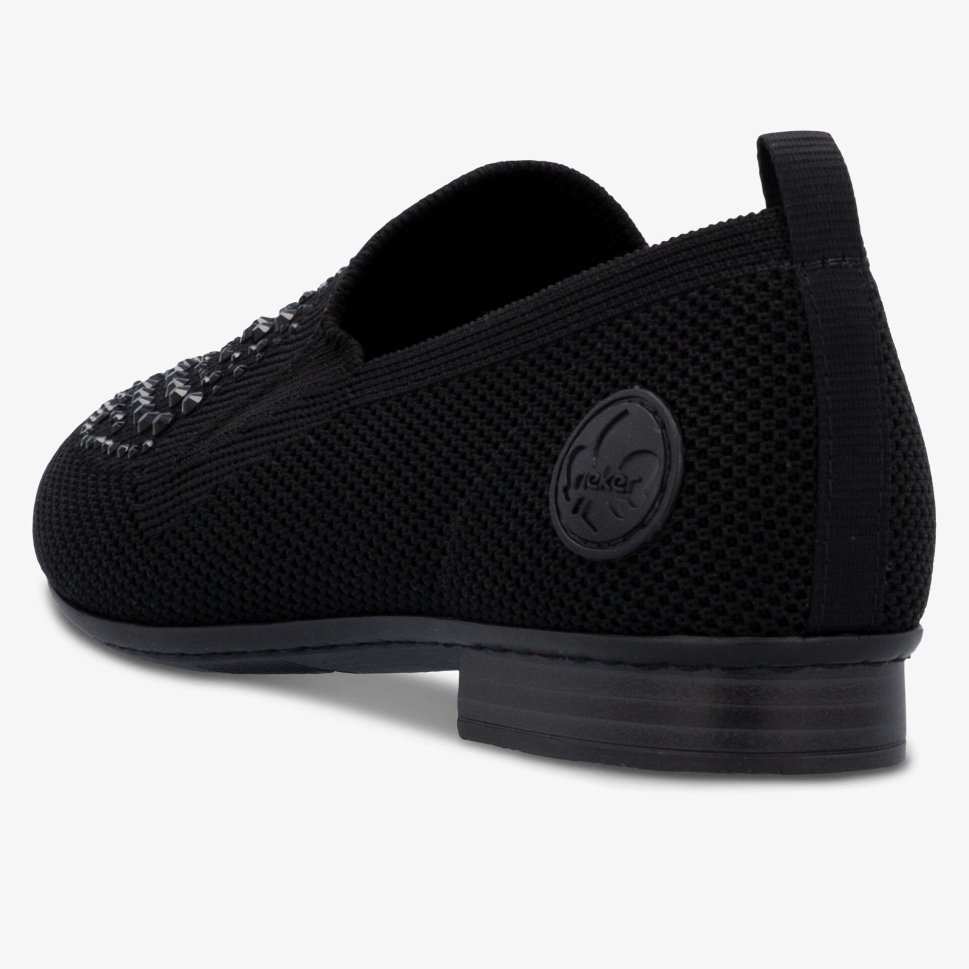 Seitliche Ansicht eines leichten, atmungsaktiven Schuhs mit elastischem Material und rutschfester Sohle in elegantem Design