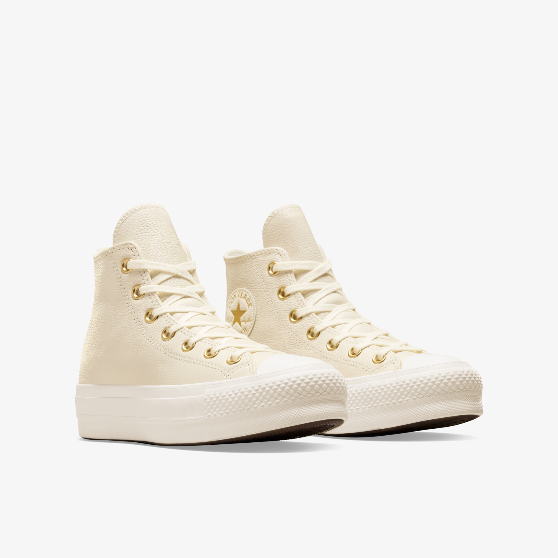 Beige High-Top Sneaker Paar mit klassischer Schnürung und robustem Sohlenprofil, bequem und modisch zugleich