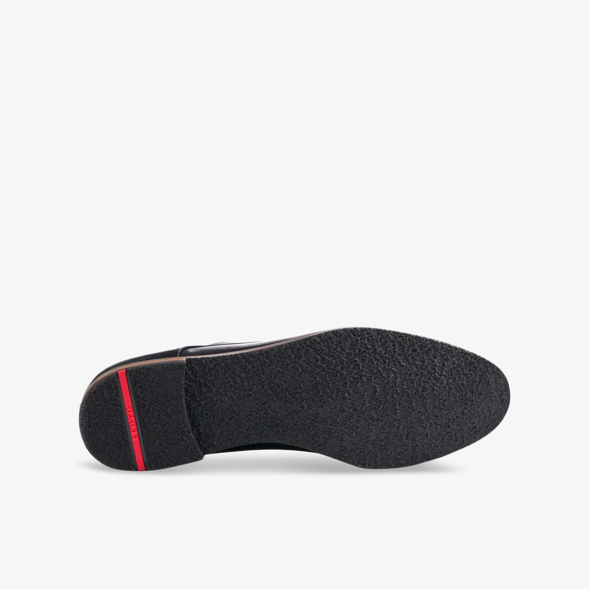 Hochwertige rutschfeste Sohle eines stylischen Schuhs für optimalen Komfort und Langlebigkeit.