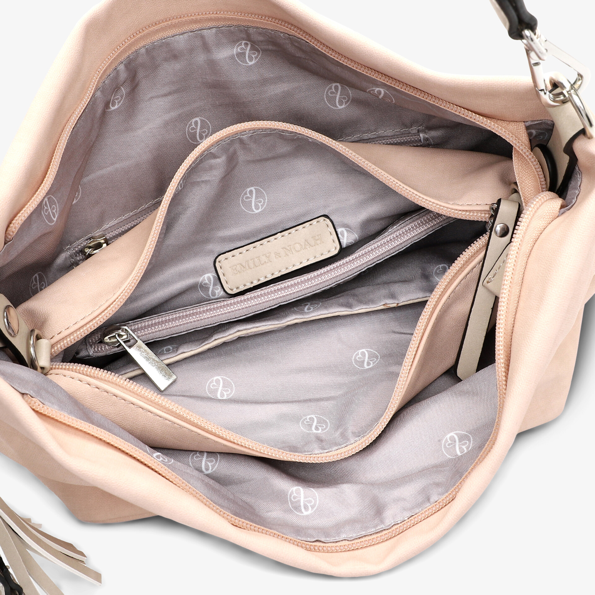 Innenansicht einer eleganten Tasche mit vielen Fächern und hochwertigem Reißverschluss