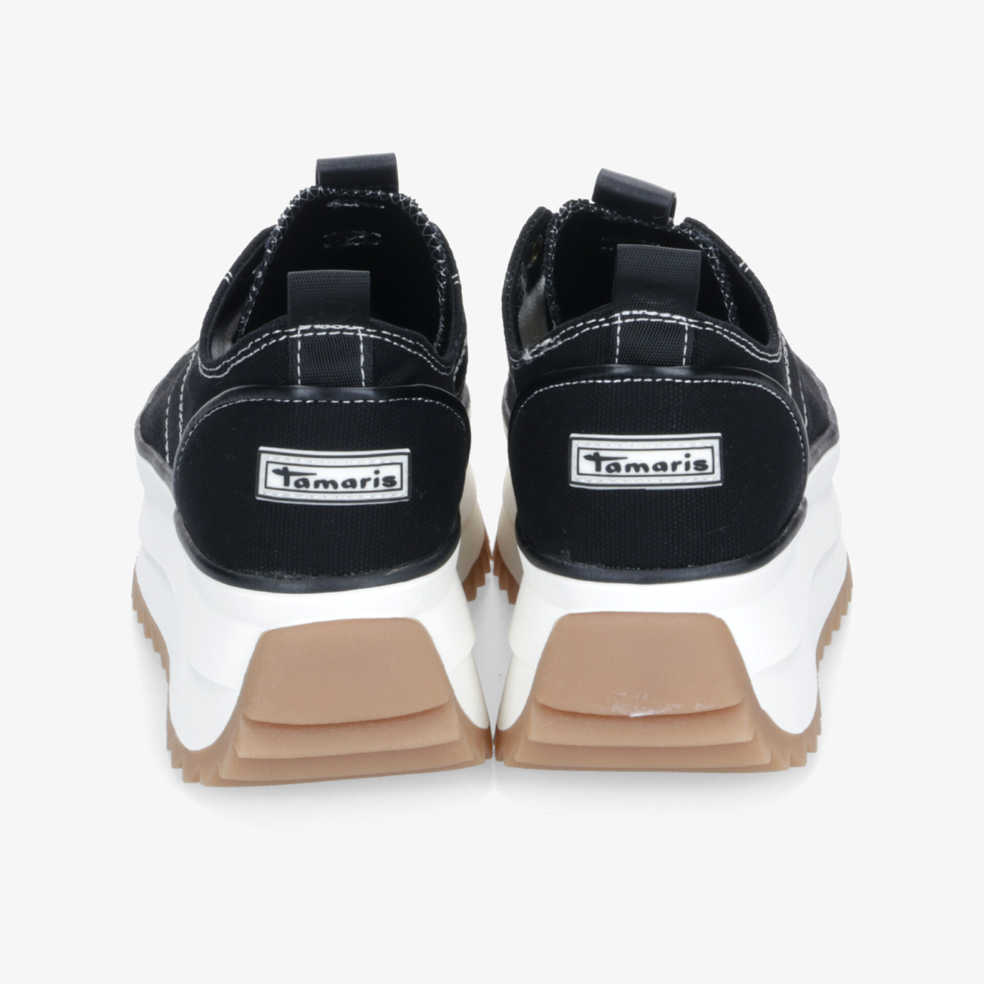 Rückansicht von sportlichen, bequemen Schuhen mit markanter, rutschfester Sohle und modernem Design