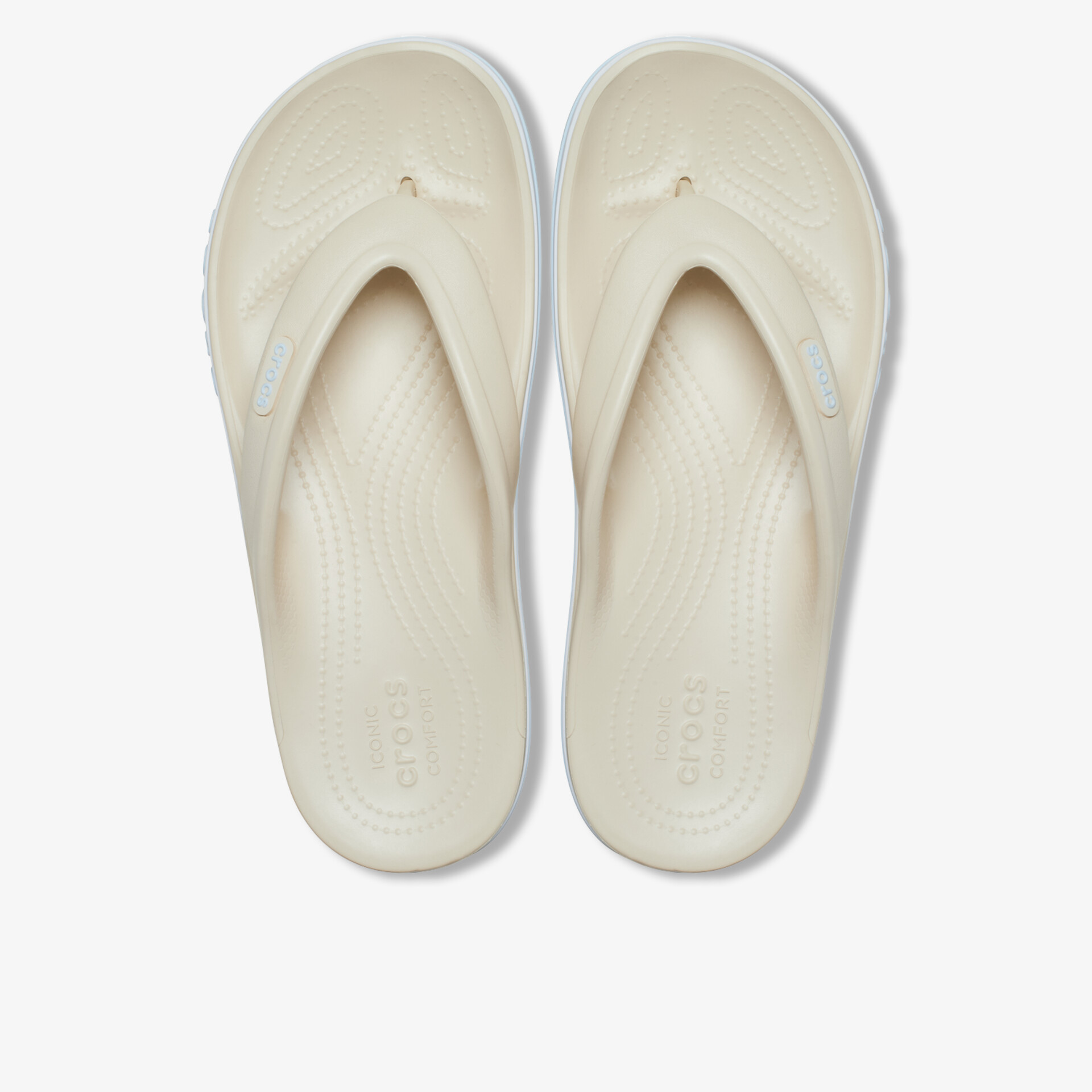 Bequeme beige Badeschuhe als Zehentrenner mit rutschfester Sohle und modernem Design