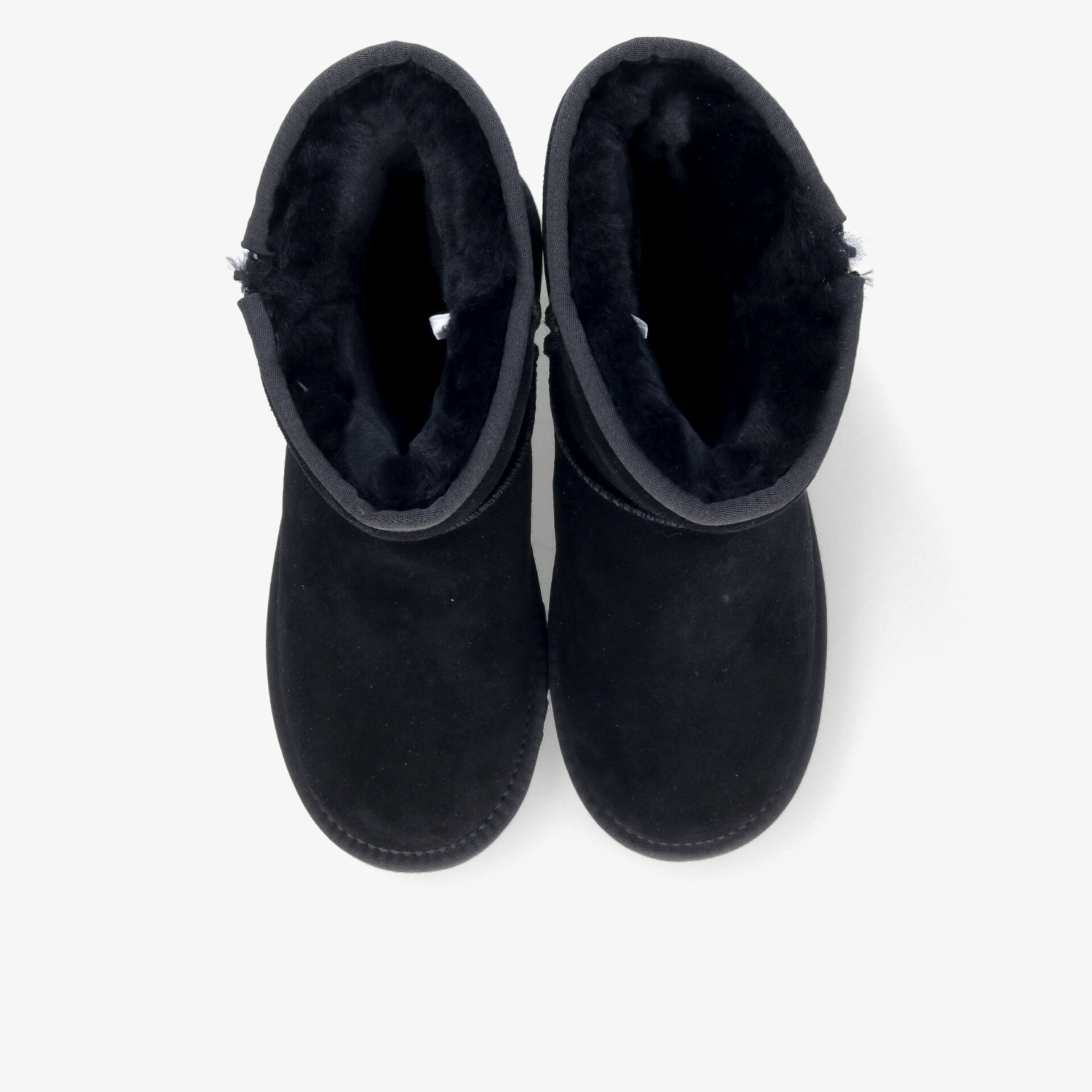 Schwarze Winterstiefel im Paar von oben, warm gefüttert und bequem mit weichem, dickem Material