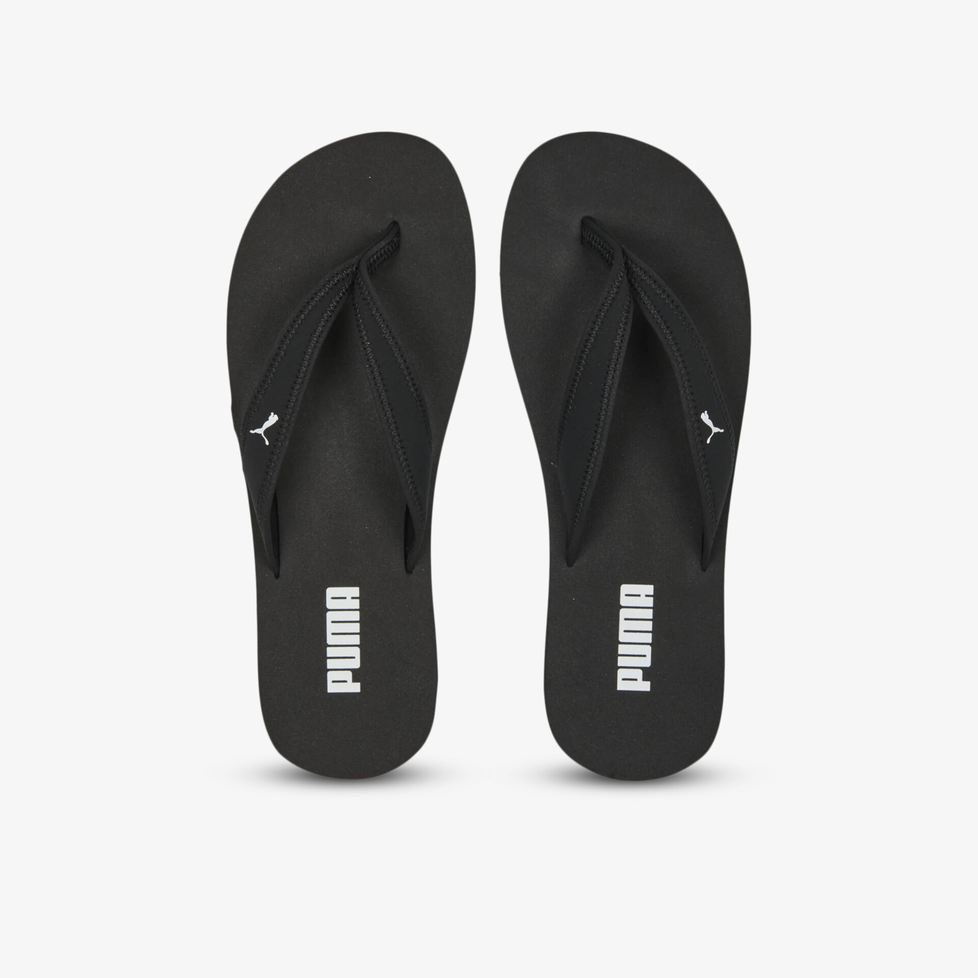 Schwarze Puma Flipflops mit bequemem Fußbett, rutschfester Sohle und sportlichem Design, Draufsicht