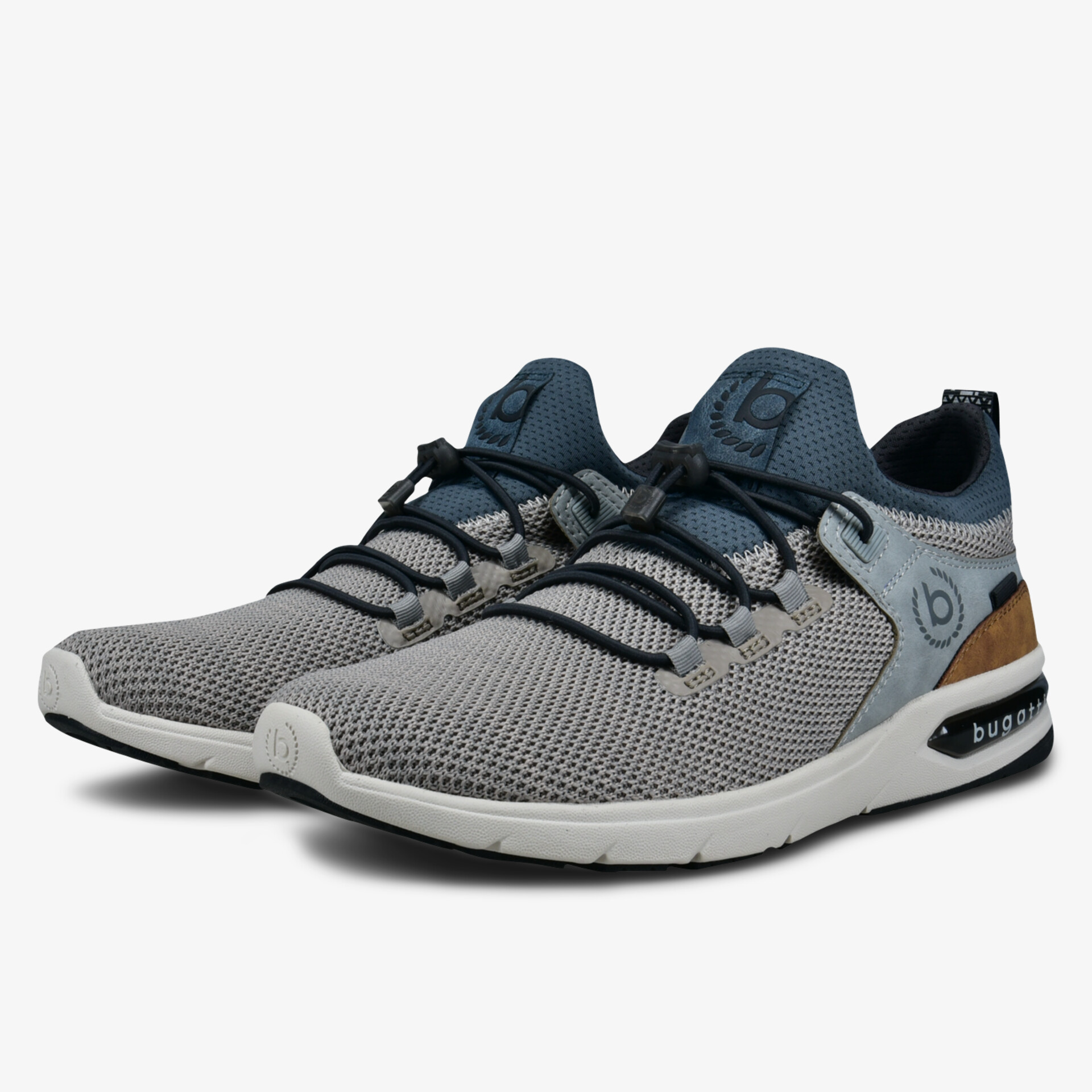 Moderne und atmungsaktive Sportschuhe mit bequemem Sitz und flexibler Sohle in graublauer Farbkombination