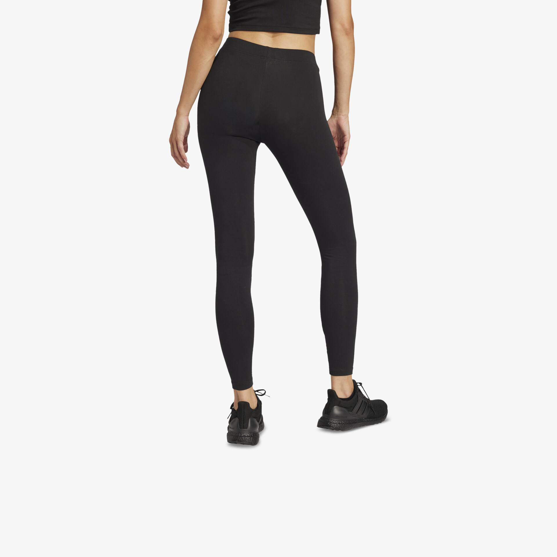 Schwarze, figurbetonte Leggings mit hoher Taille, komfortabel und elastisch, Rückansicht getragen