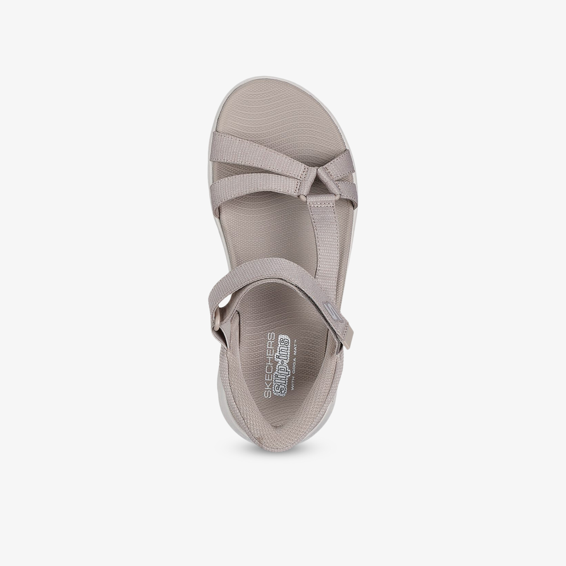 Beige Sandale mit verstellbarem Riemen, hübscher Schleife und bequemem, flexiblem Material in Draufsicht