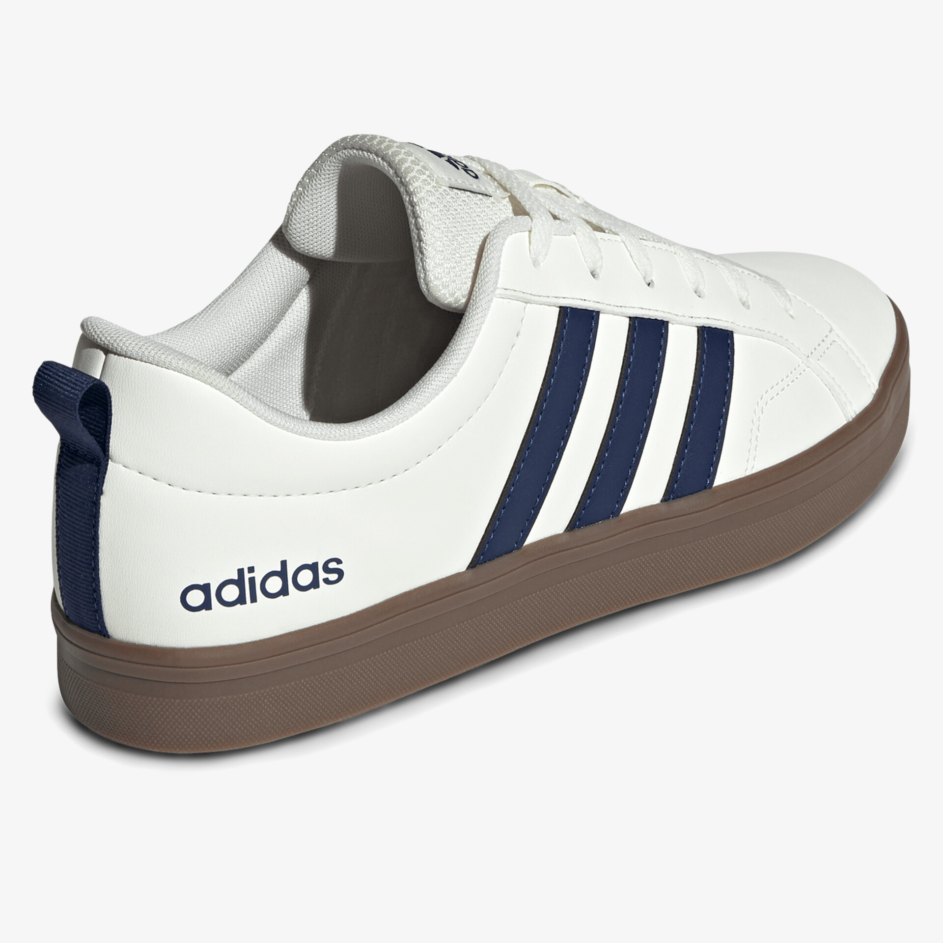 Seitliche Ansicht eines weißen Sneakers mit dunkelblauen Streifen und brauner rutschfester Sohle