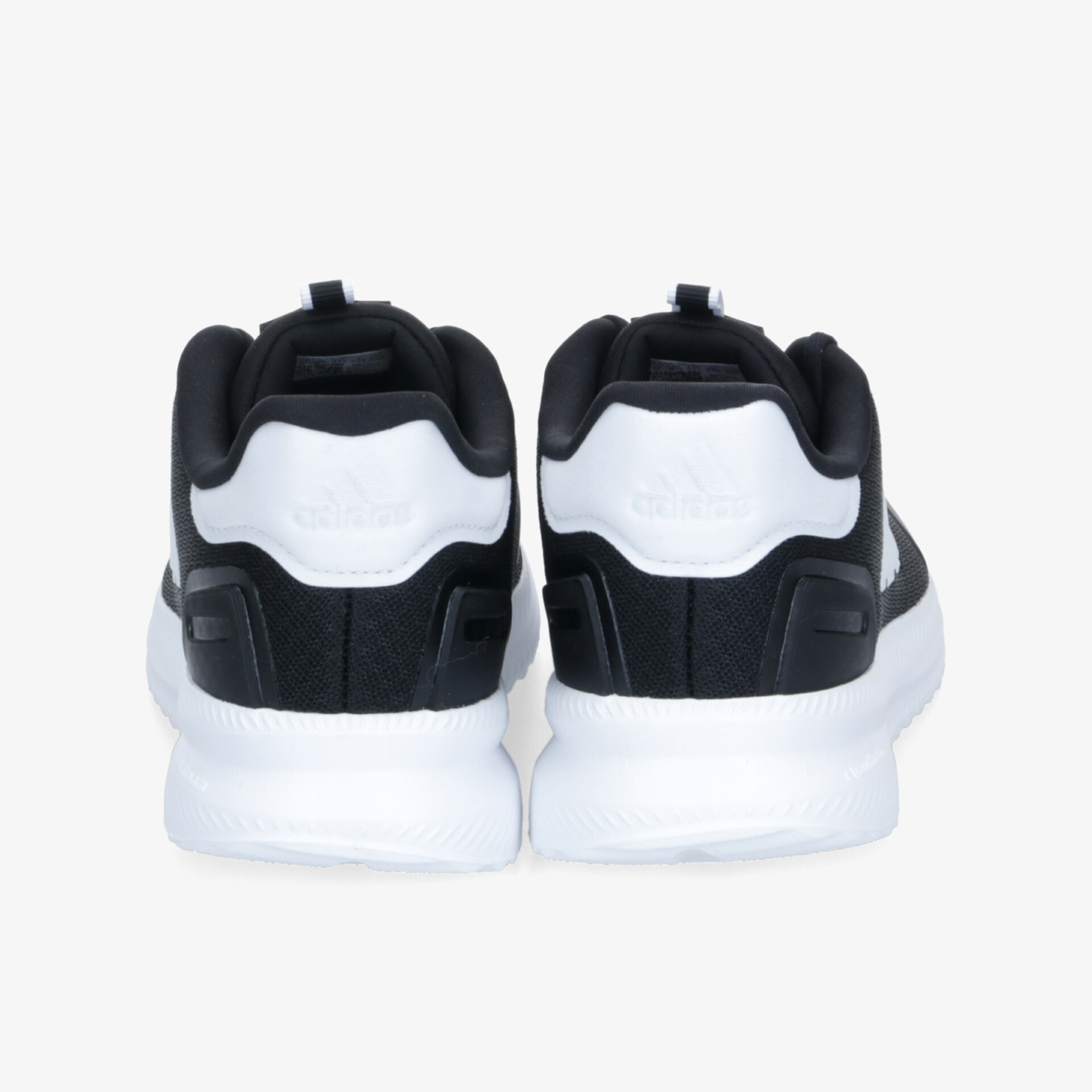 Schwarze und weiße Sneaker Rückansicht mit gepolsterter Ferse und stabiler, flexibler Sohle
