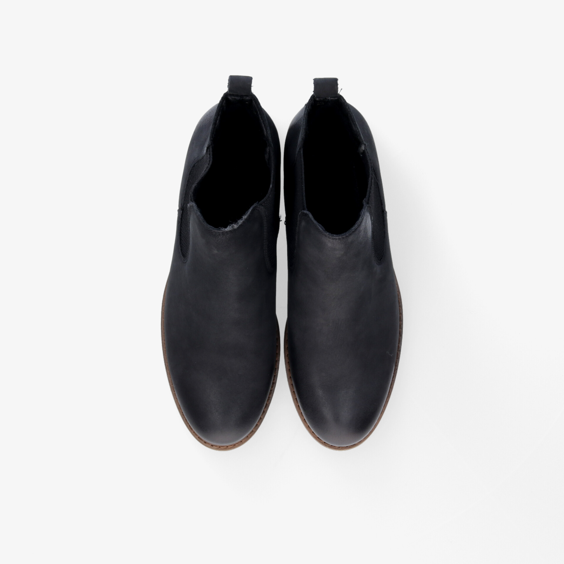 Elegante schwarze Stiefeletten aus hochwertigem Material mit zeitlosem Design für vielseitige Anlässe.