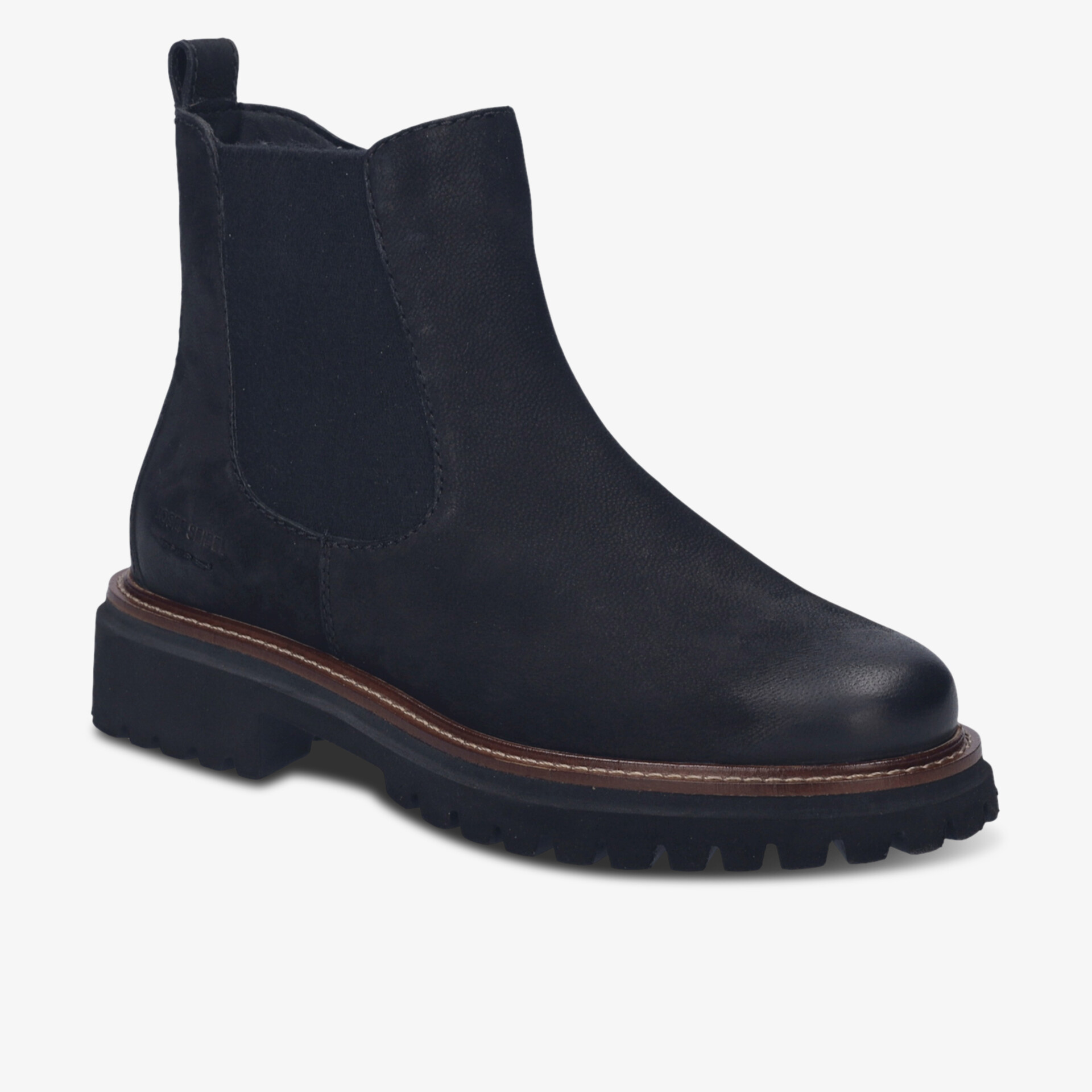 Schwarzer Chelsea Boot mit elastischen Einsätzen und profilierter robusten Sohle in seitlicher Ansicht
