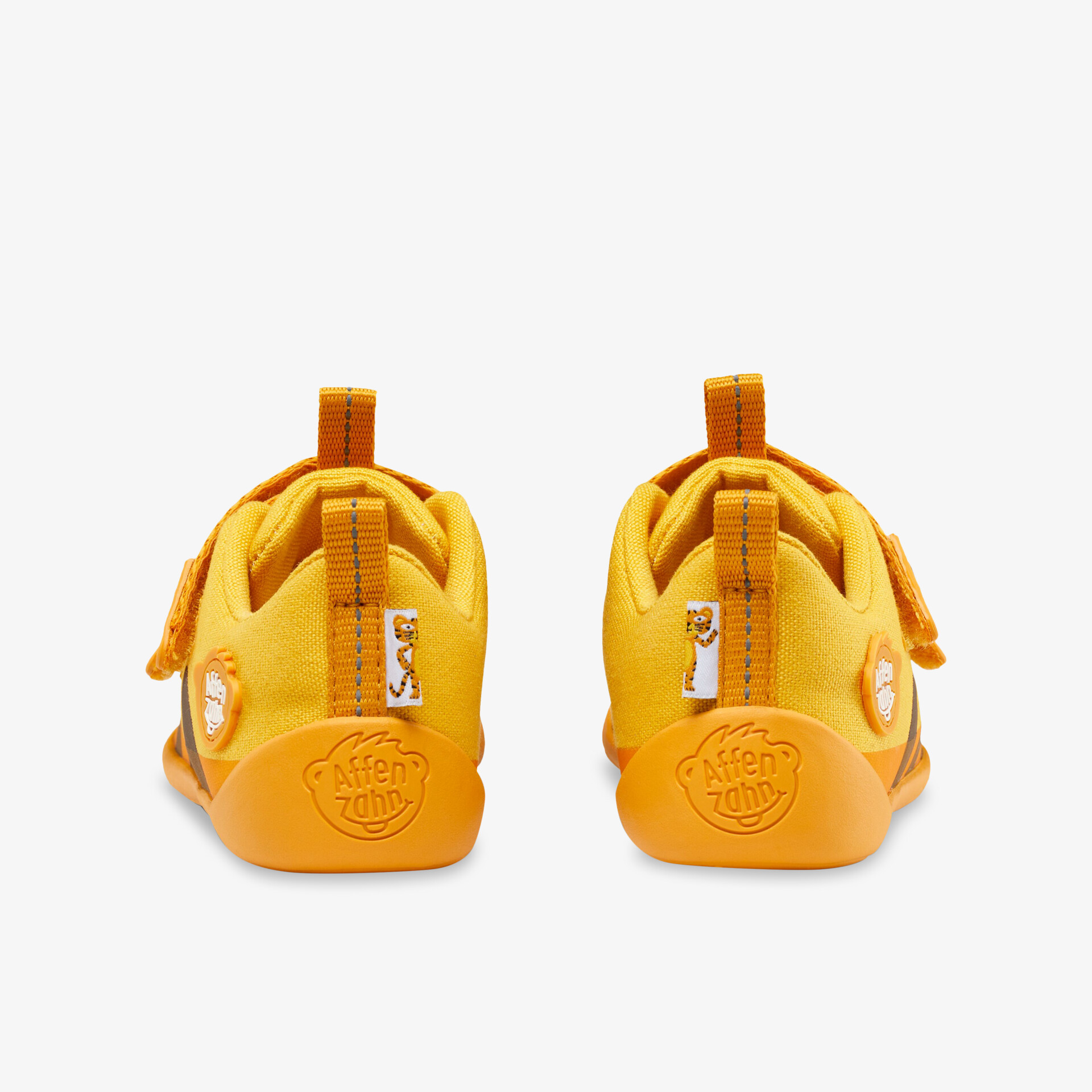 Bequeme gelbe Sneaker mit sportlichem Design und rutschfester Sohle für vielseitigen Einsatz.