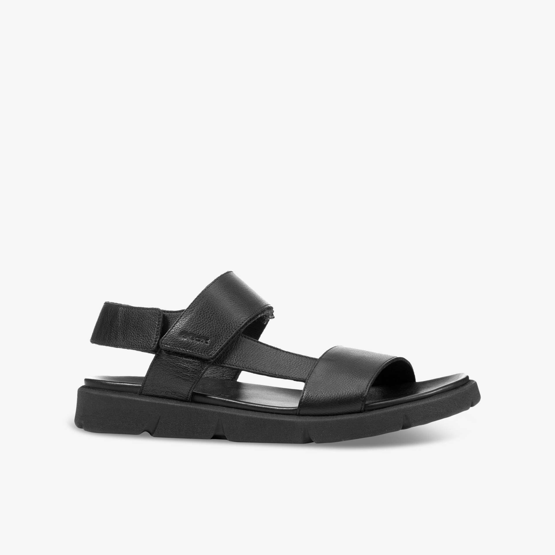 Elegante schwarze Sandale mit komfortablem Fußbett und praktischem Klettverschluss für bequemen Halt.