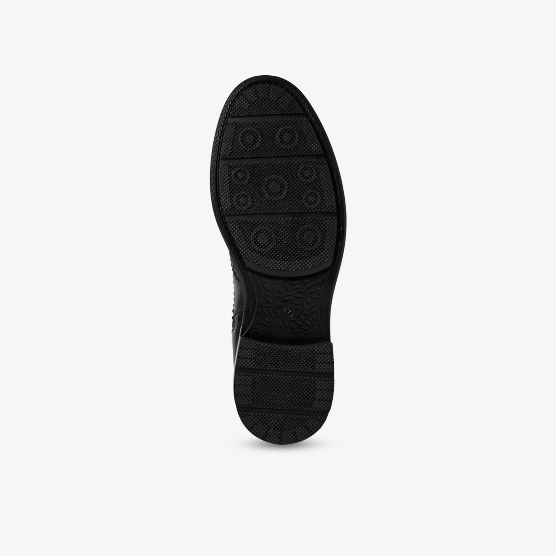 Robuste schwarze Schuhsohle mit rutschfestem Profil für beste Haftung und hohen Tragekomfort
