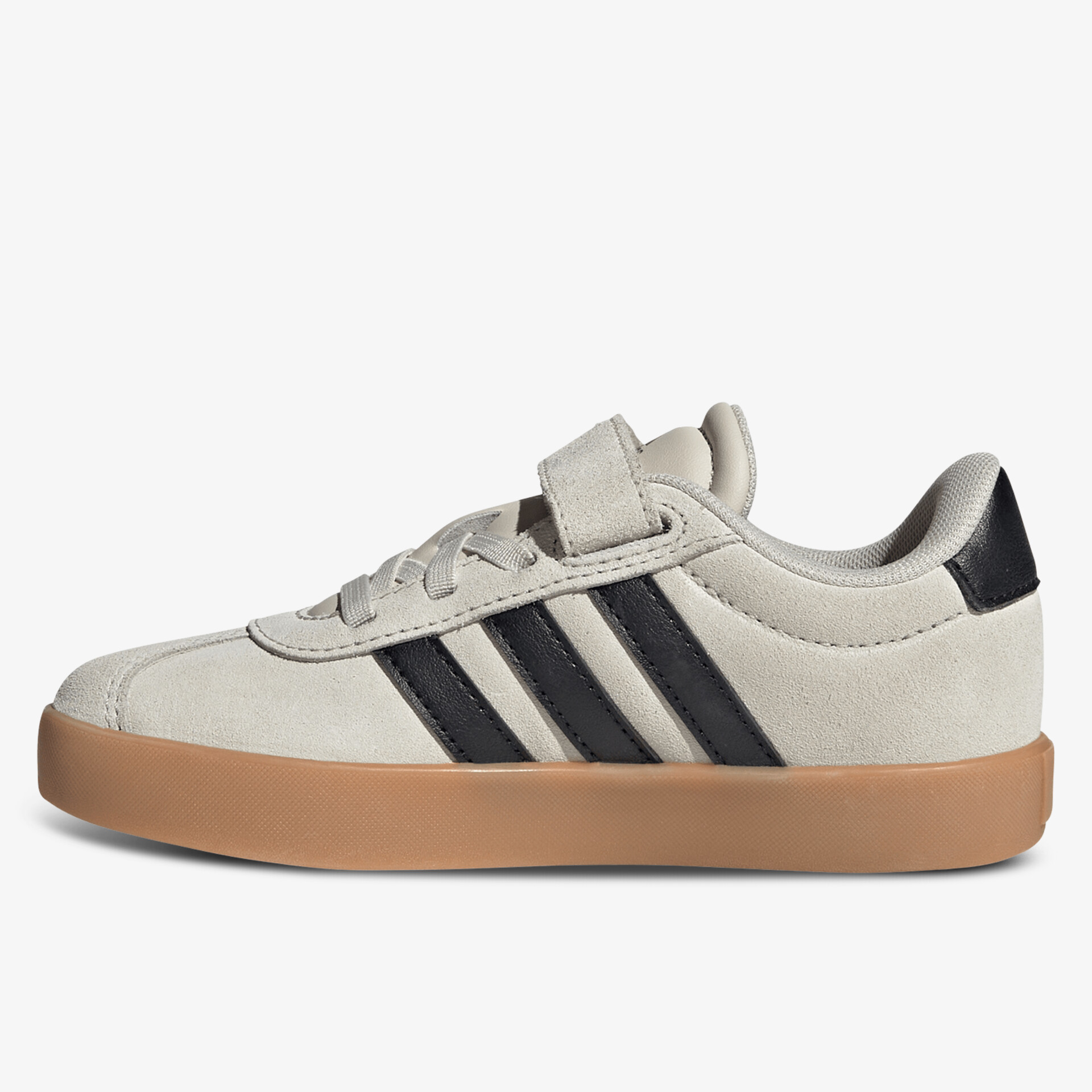 Seitliche Ansicht des bequemen Sneakers mit Klettverschluss und robuster Gummisohle für sportlichen Alltag