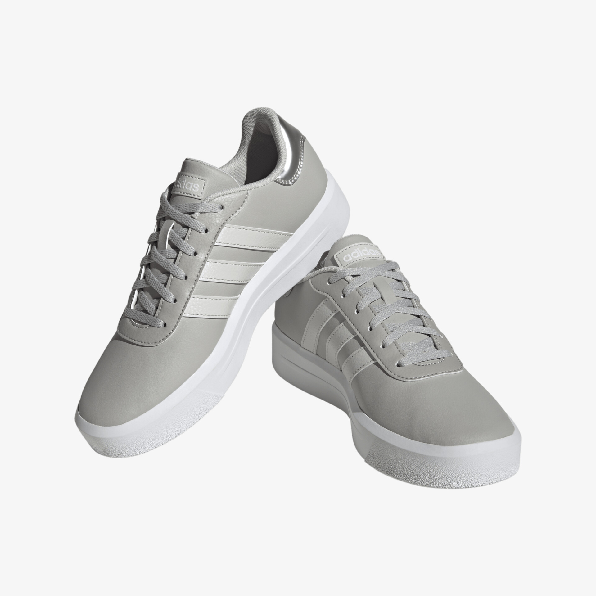 Stylische graue Sneakers mit weißem Rand und klassischer Schnürung für lässigen Alltagslook und hohen Komfort.