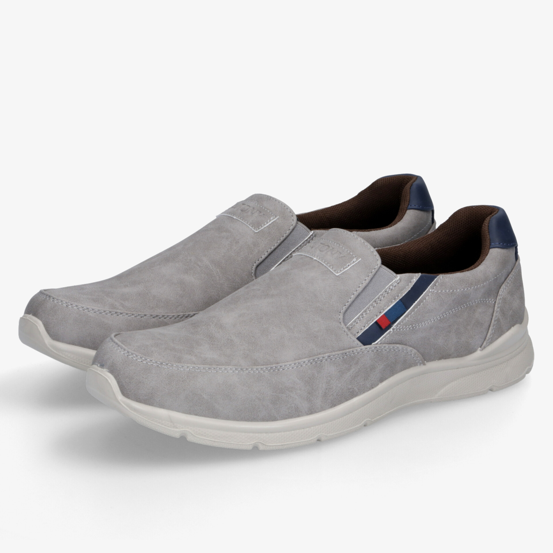 Gepaarte graue Slip-On Schuhe mit weich gepolsterter Innenseite und rutschfester weißer Sohle für hohen Komfort