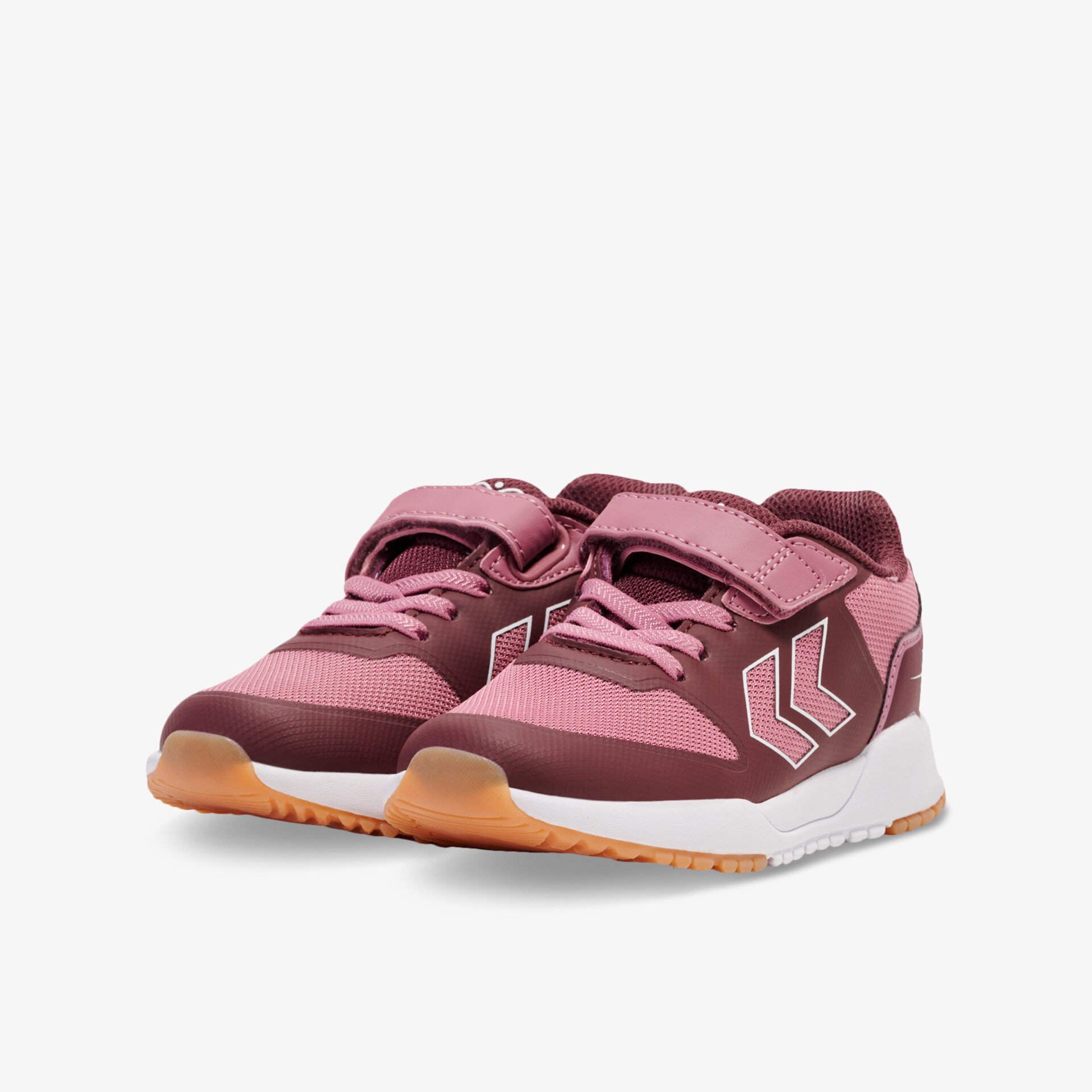 Stylische pinke Sportschuhe mit Klettverschluss und rutschfester Sohle, ideal für sportliche Aktivitäten.